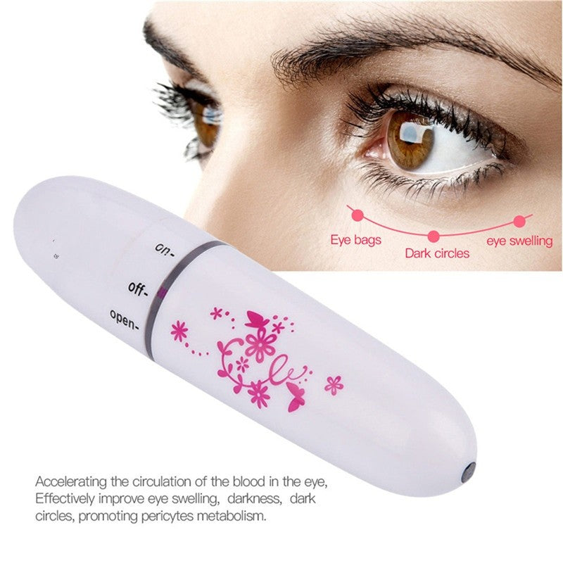 Mini Electric Eye Massager in white and pink, designed to reduce dark circles and wrinkles with micro-vibration technology.