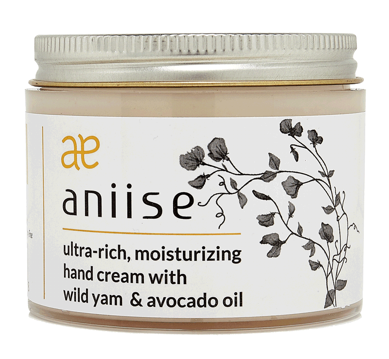 A tube of Aniise Moisturizing Wild Yam Hand Cream with a natural background, showcasing its rich texture and ingredients.