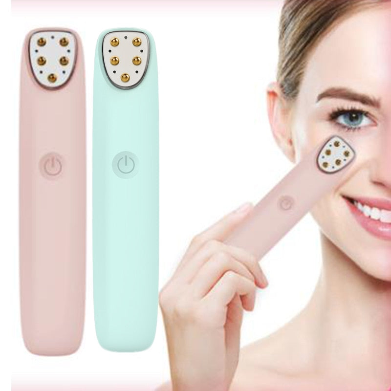 Multi-functional RF Eye Massager in pink color, designed for reducing wrinkles and dark circles around the eyes, featuring a sleek and ergonomic design.