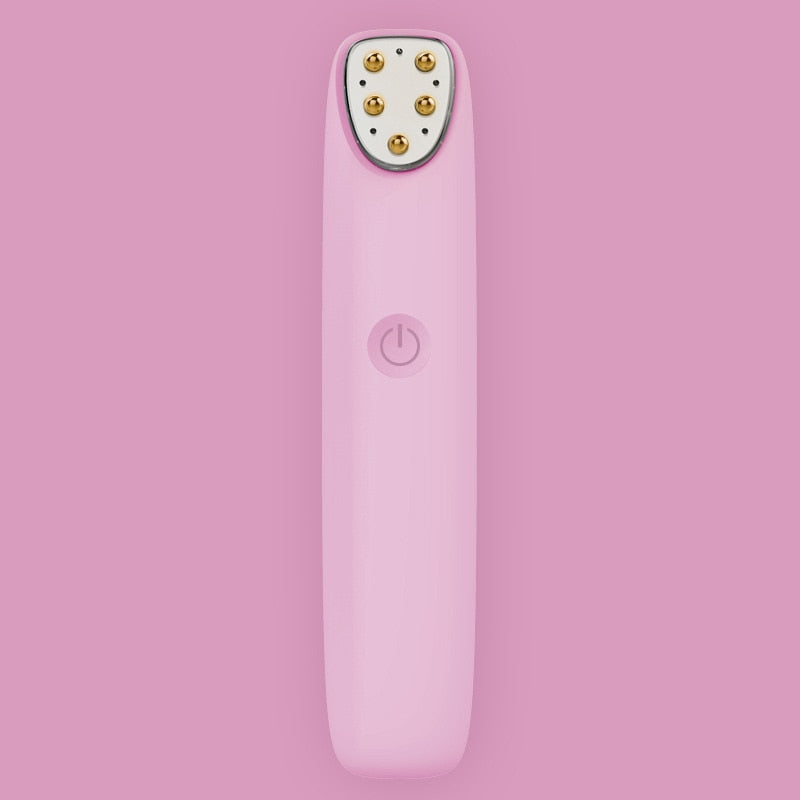 Multi-functional RF Eye Massager in pink color, designed for reducing wrinkles and dark circles around the eyes, featuring a sleek and ergonomic design.