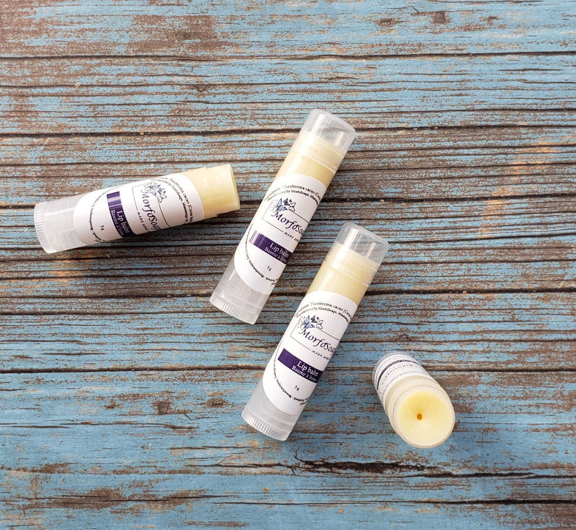 Natural Handmade Unscented Lip Balm in a tube, showcasing its creamy texture and organic ingredients.