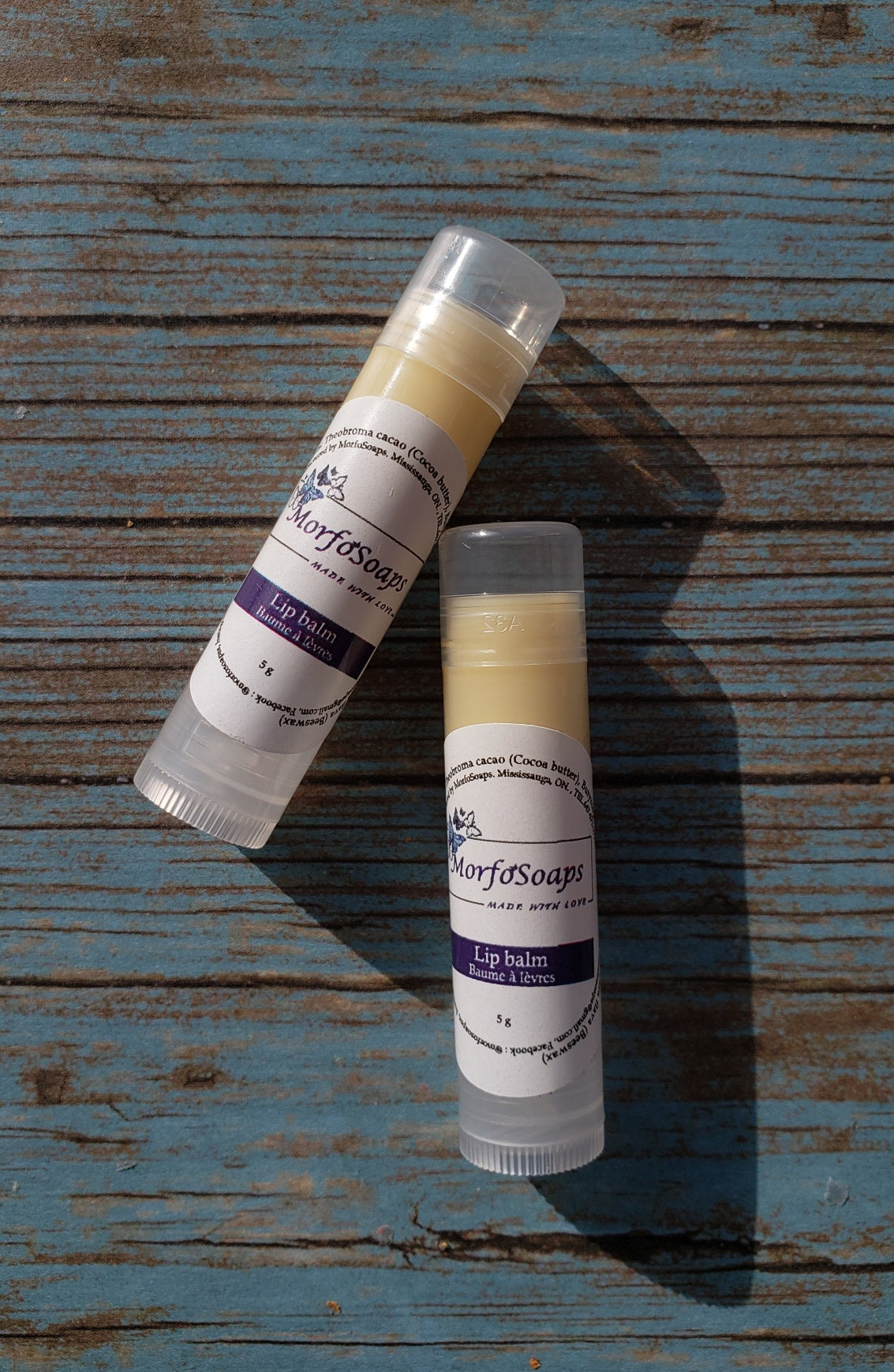 Natural Handmade Unscented Lip Balm in a tube, showcasing its creamy texture and organic ingredients.