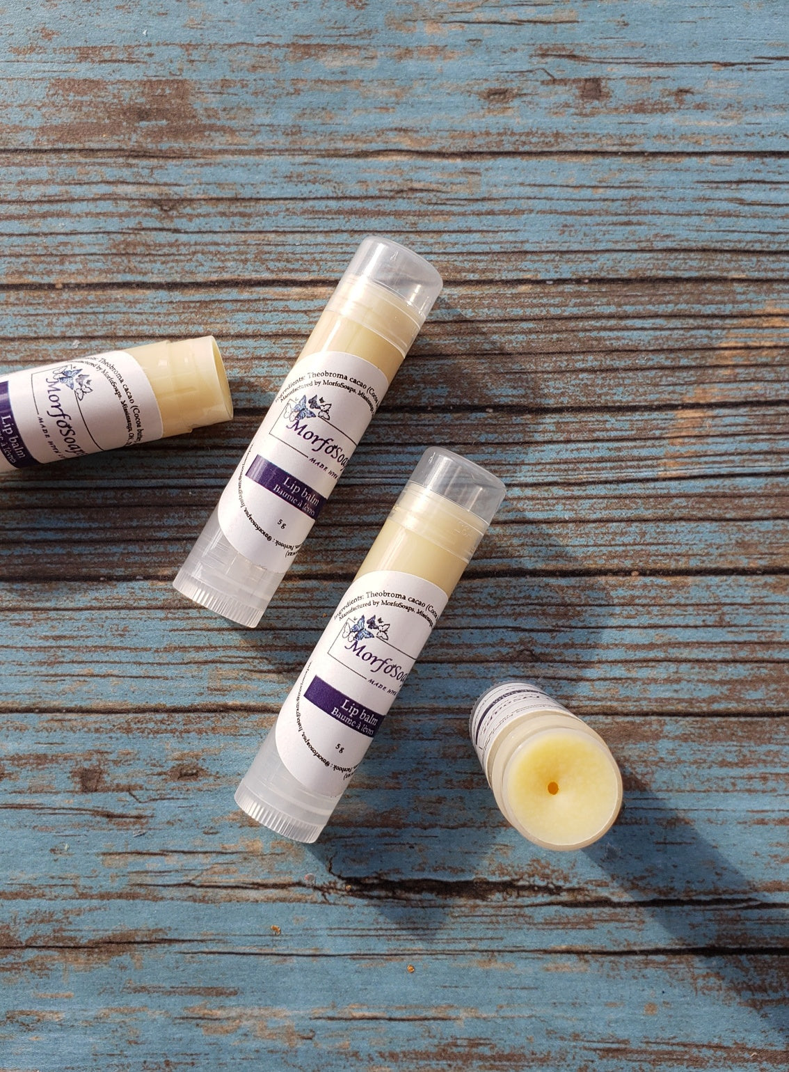 Natural Handmade Unscented Lip Balm in a tube, showcasing its creamy texture and organic ingredients.