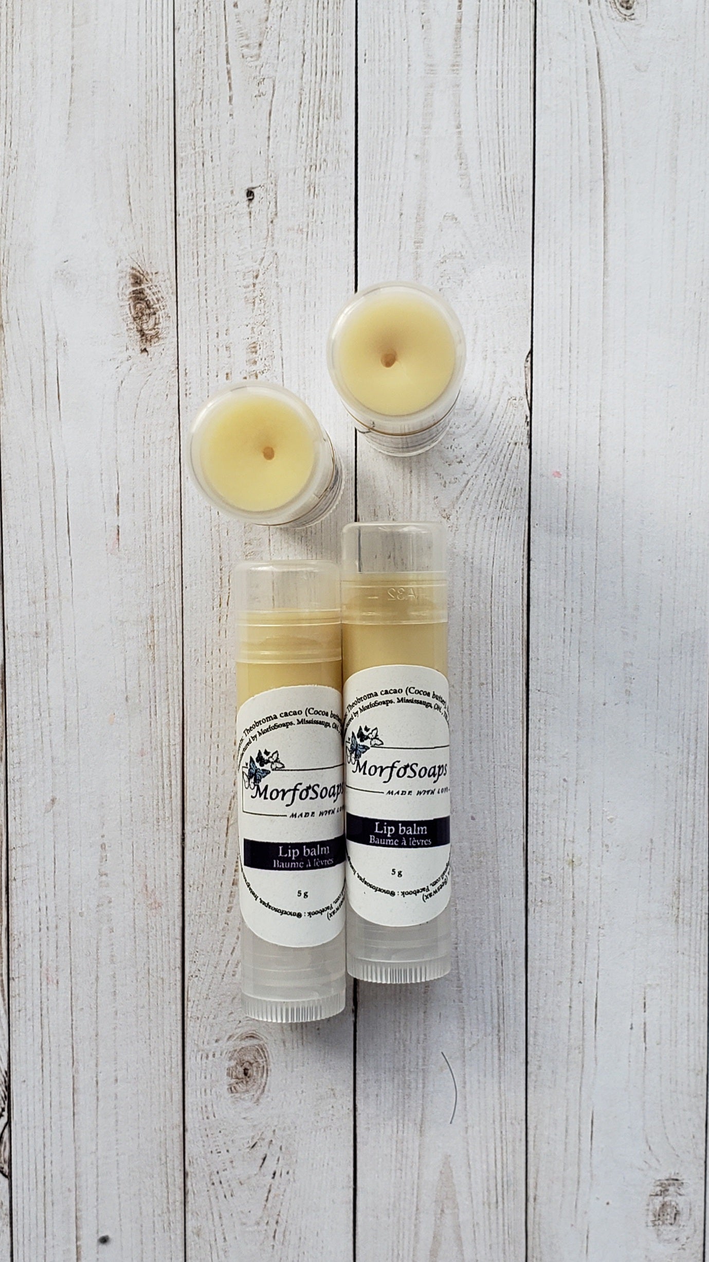 Natural Handmade Unscented Lip Balm in a tube, showcasing its creamy texture and organic ingredients.