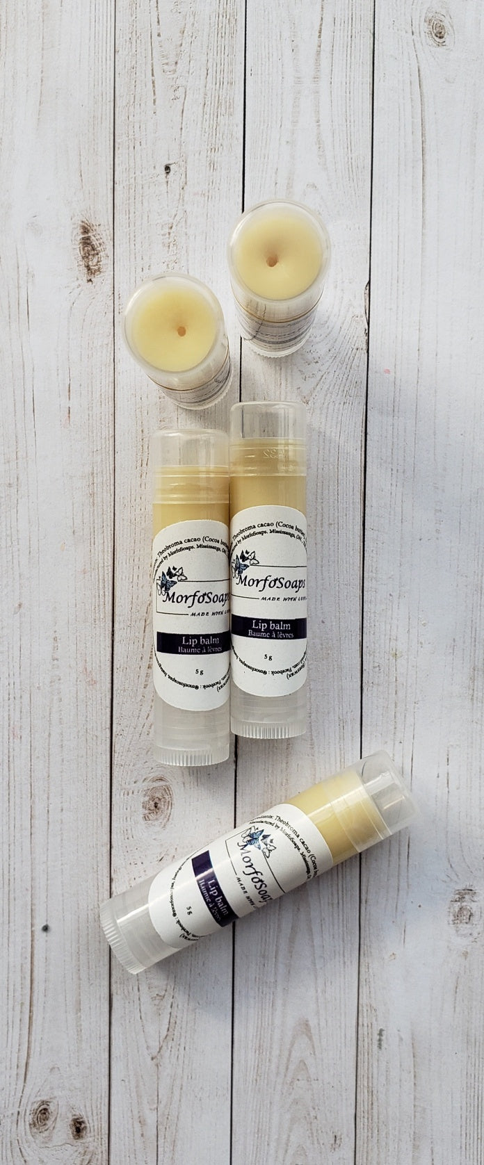 Natural Handmade Unscented Lip Balm in a tube, showcasing its creamy texture and organic ingredients.