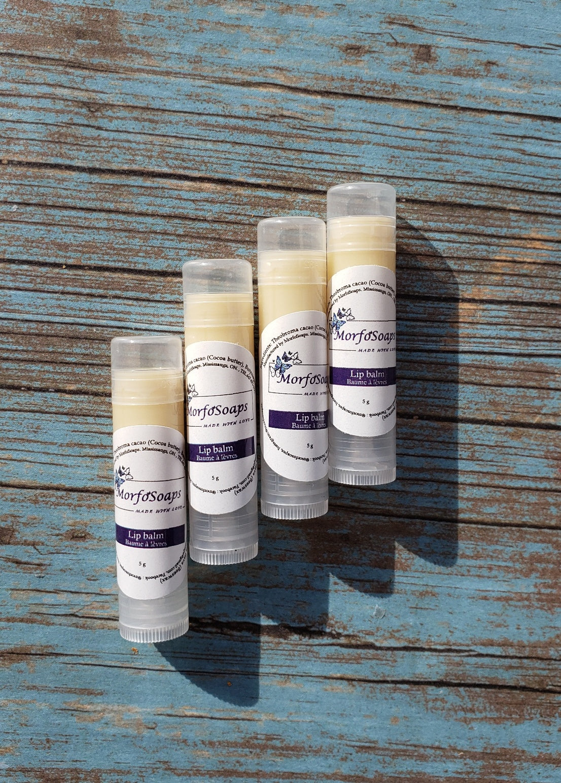 Natural Handmade Unscented Lip Balm in a tube, showcasing its creamy texture and organic ingredients.