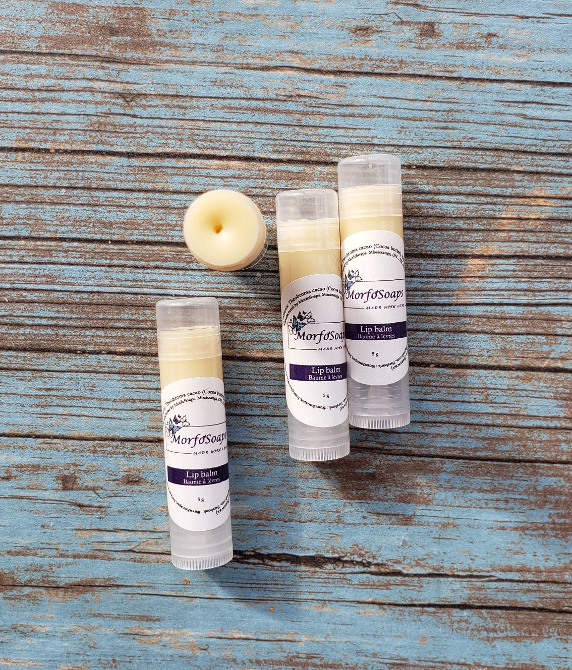 Natural Handmade Unscented Lip Balm in a tube, showcasing its creamy texture and organic ingredients.