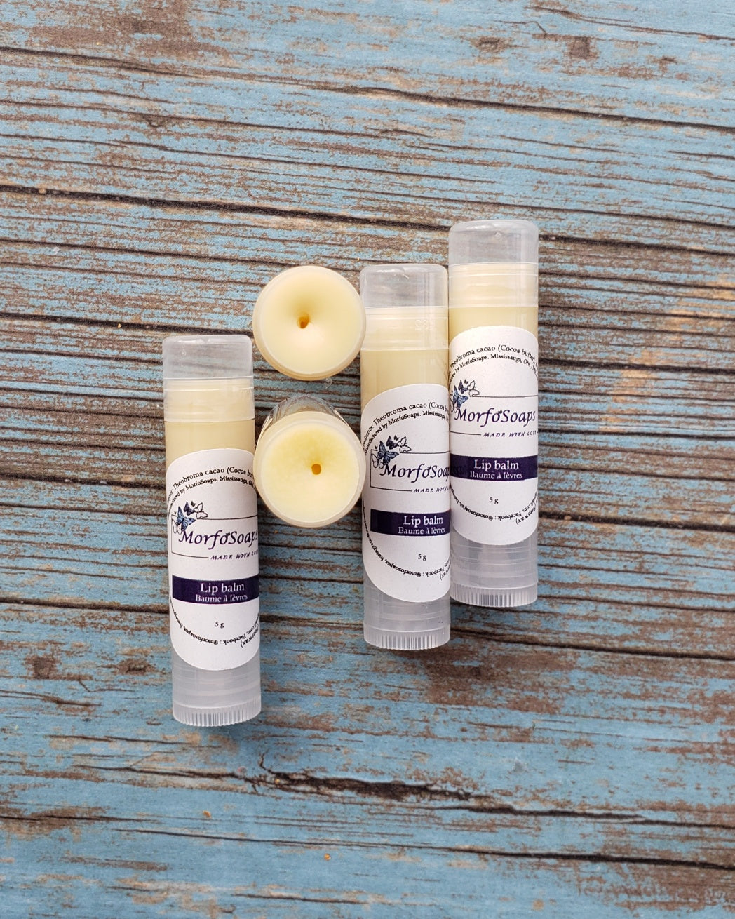 Natural Handmade Unscented Lip Balm in a tube, showcasing its creamy texture and organic ingredients.