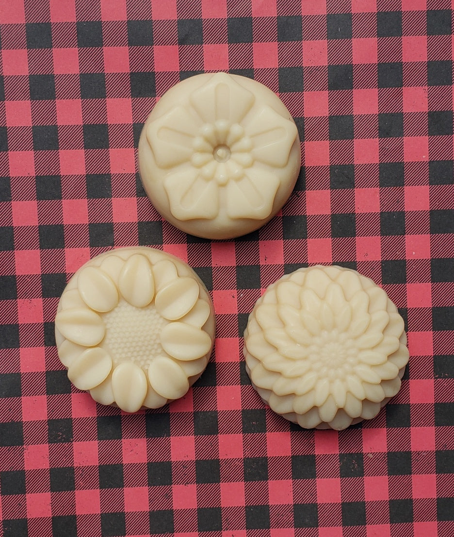 Natural Handmade Shampoo Bar with lavender and chamomile, showcasing its unique texture and artisanal design.