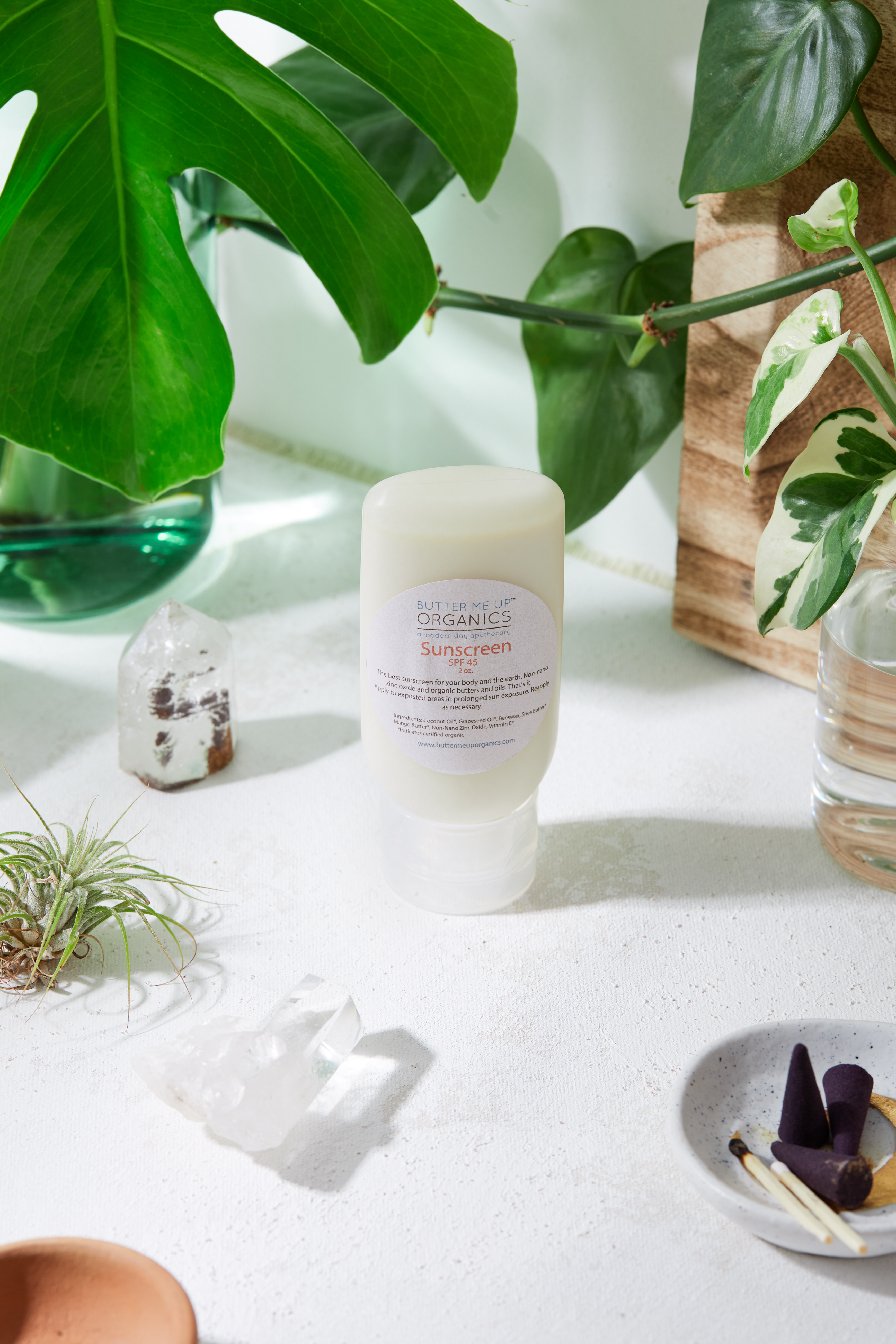 Natural organic sunscreen in a sturdy jar with a vibrant label, showcasing its eco-friendly packaging and organic ingredients.