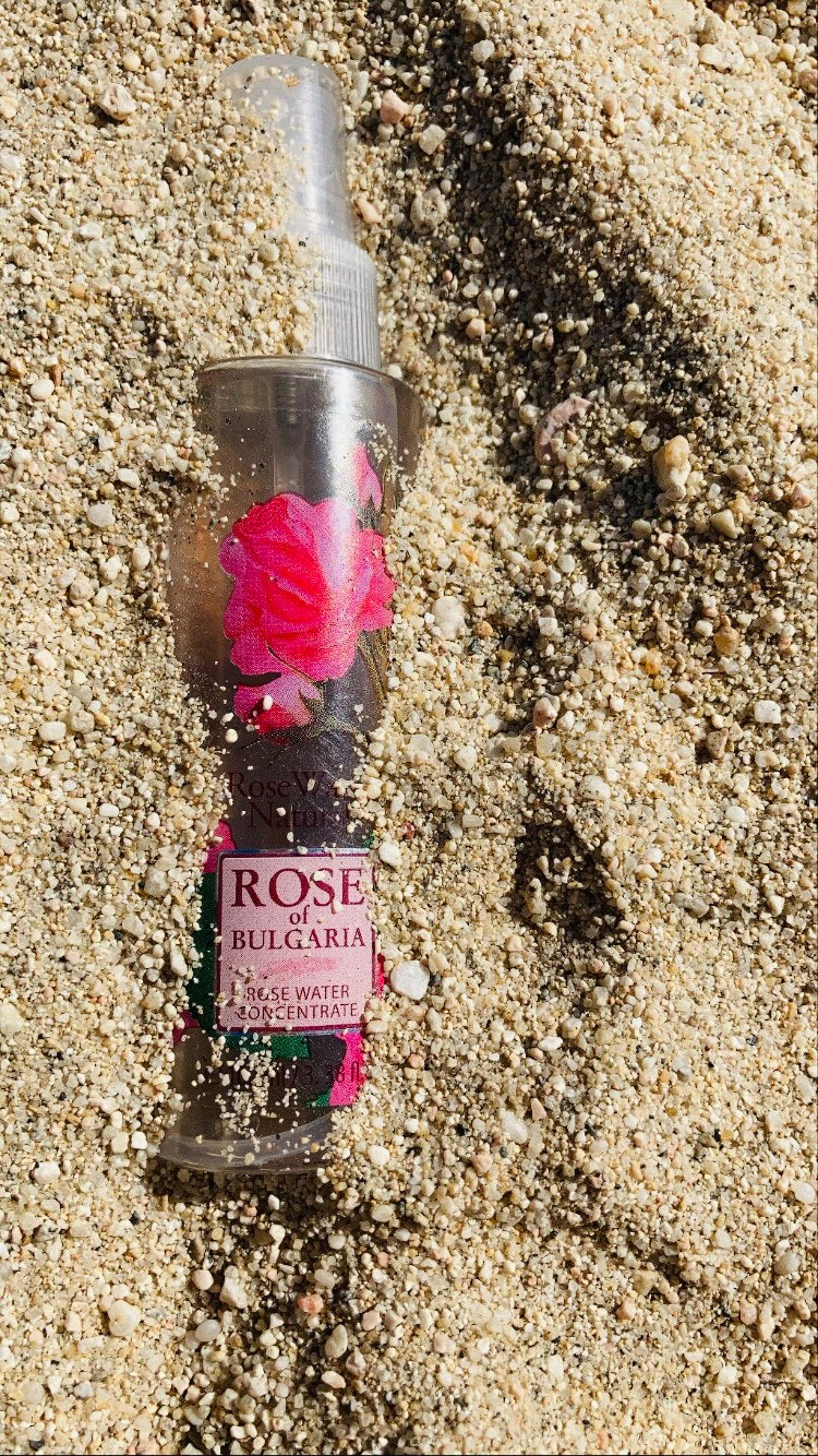 100ml bottle of Natural Rose Water from Biofresh, featuring a floral design and a spray nozzle.