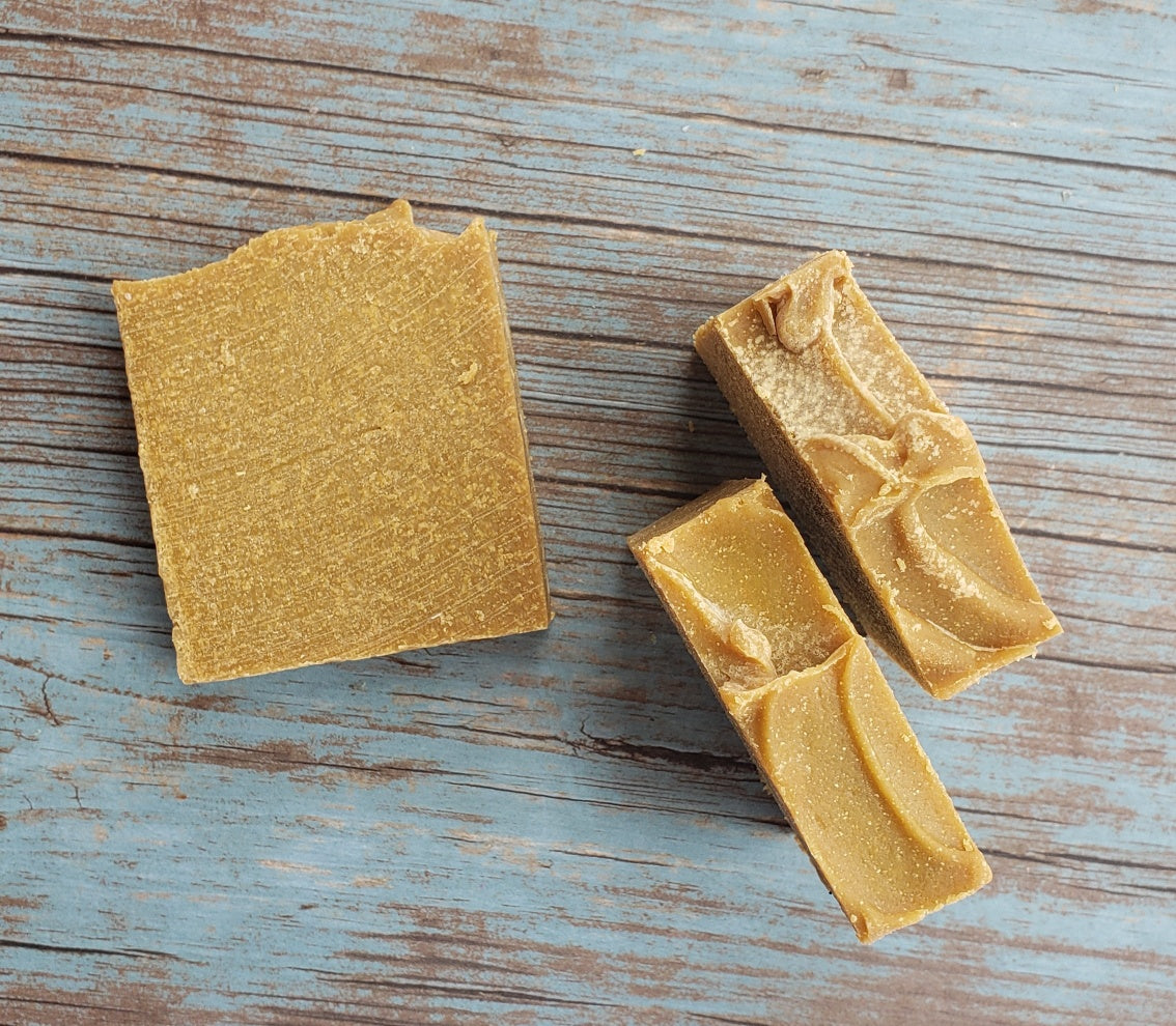 A bar of Natural Sulfur Soap showcasing its unique texture and color, handcrafted in Mississauga, Ontario.