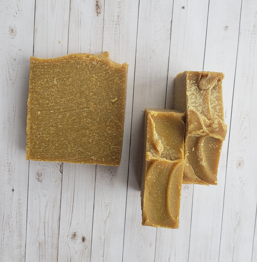 A bar of Natural Sulfur Soap showcasing its unique texture and color, handcrafted in Mississauga, Ontario.