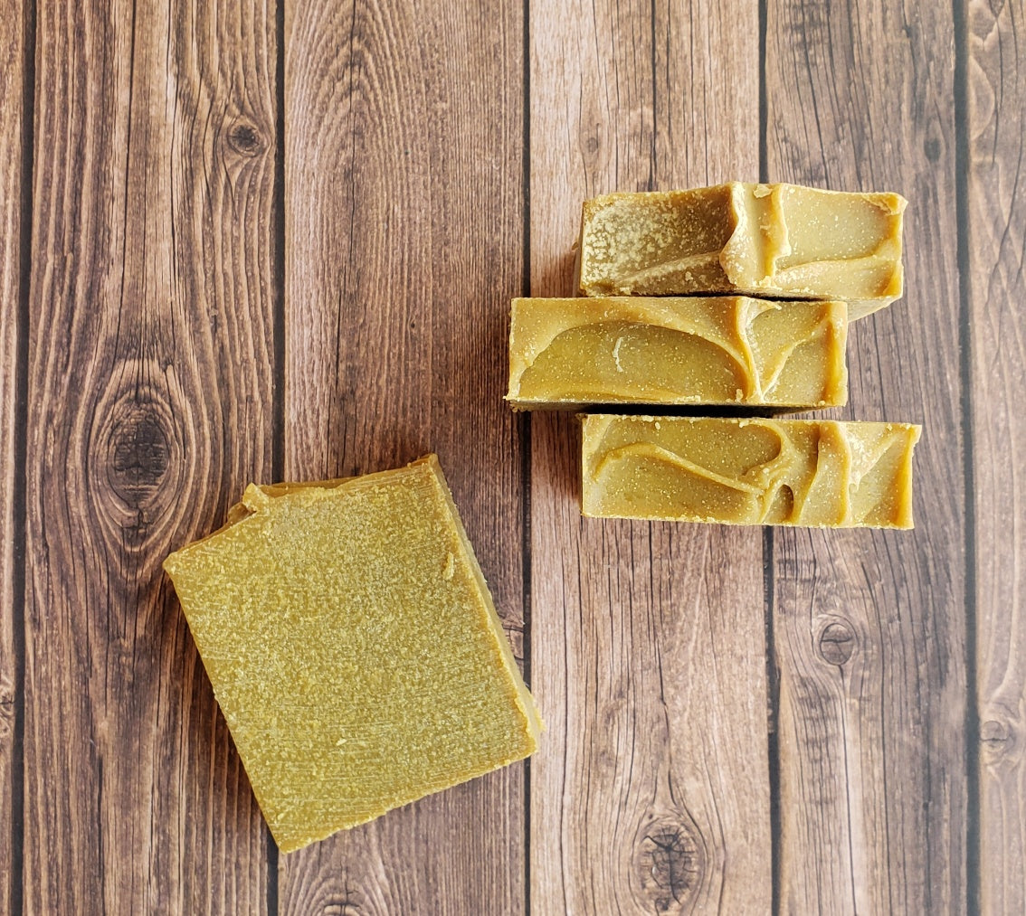 A bar of Natural Sulfur Soap showcasing its unique texture and color, handcrafted in Mississauga, Ontario.