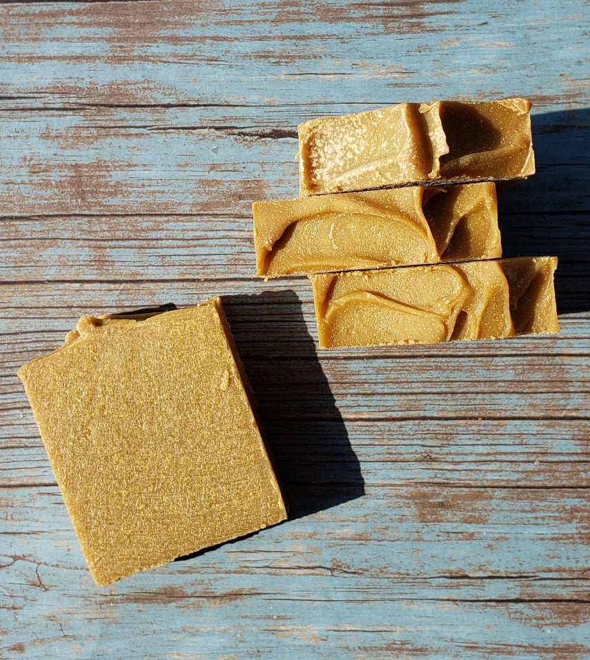 A bar of Natural Sulfur Soap showcasing its unique texture and color, handcrafted in Mississauga, Ontario.