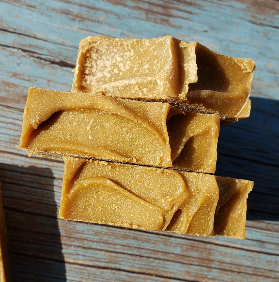 A bar of Natural Sulfur Soap showcasing its unique texture and color, handcrafted in Mississauga, Ontario.