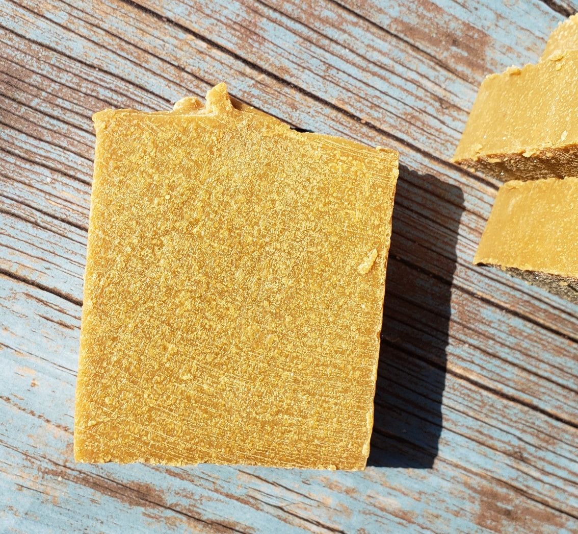 A bar of Natural Sulfur Soap showcasing its unique texture and color, handcrafted in Mississauga, Ontario.