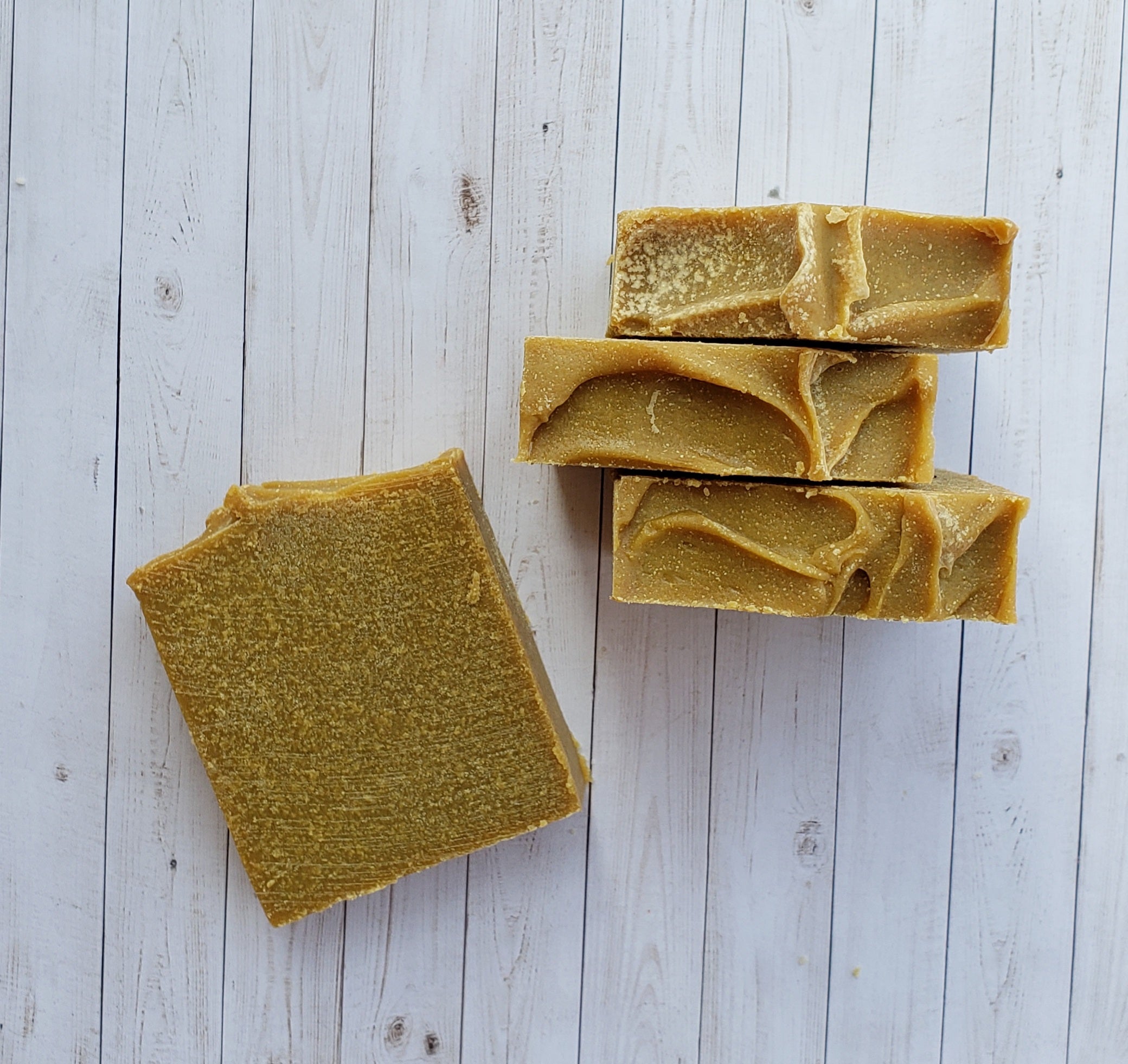 A bar of Natural Sulfur Soap showcasing its unique texture and color, handcrafted in Mississauga, Ontario.