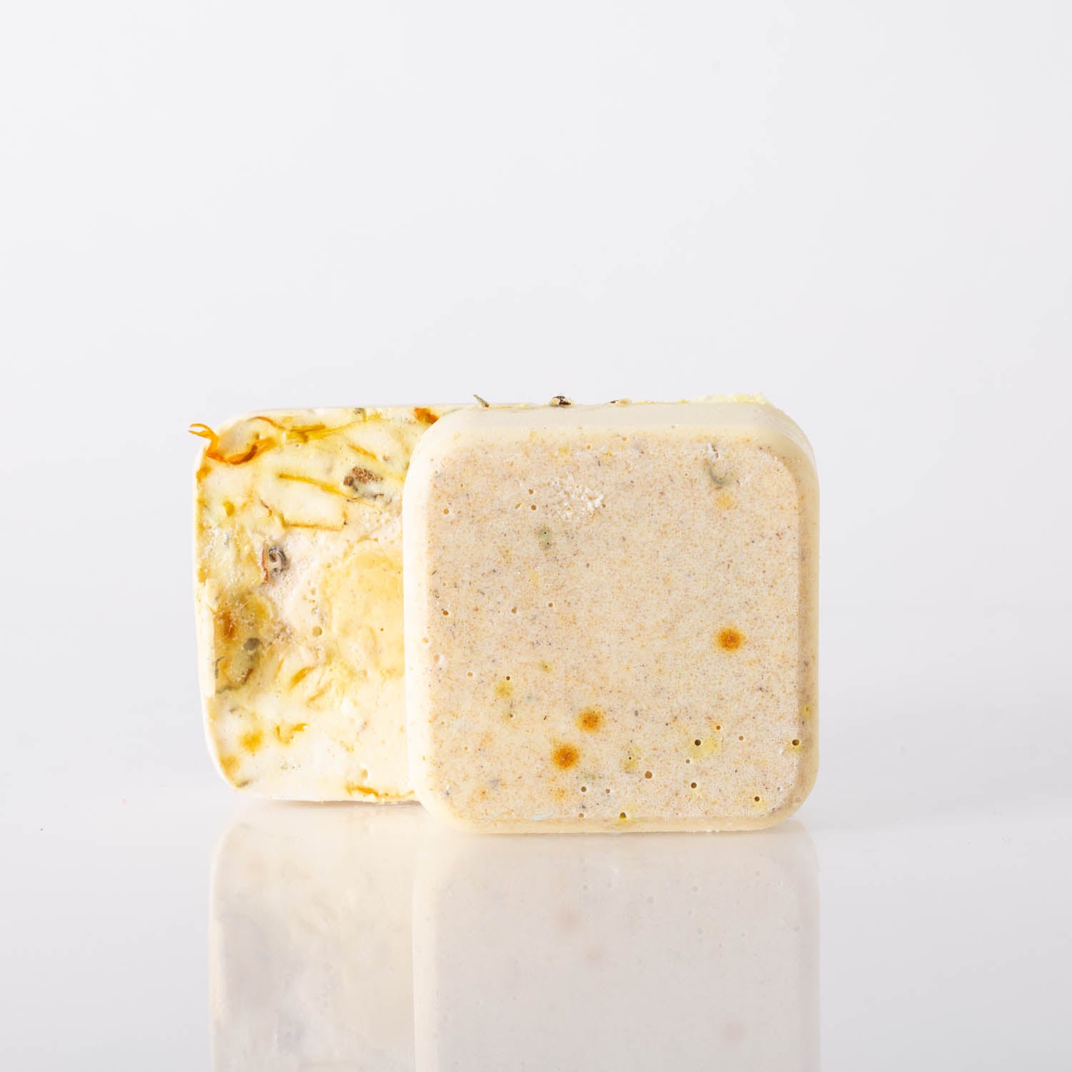 Oatmeal Face & Body Soap with natural ingredients, showcasing its creamy texture and oatmeal flakes.