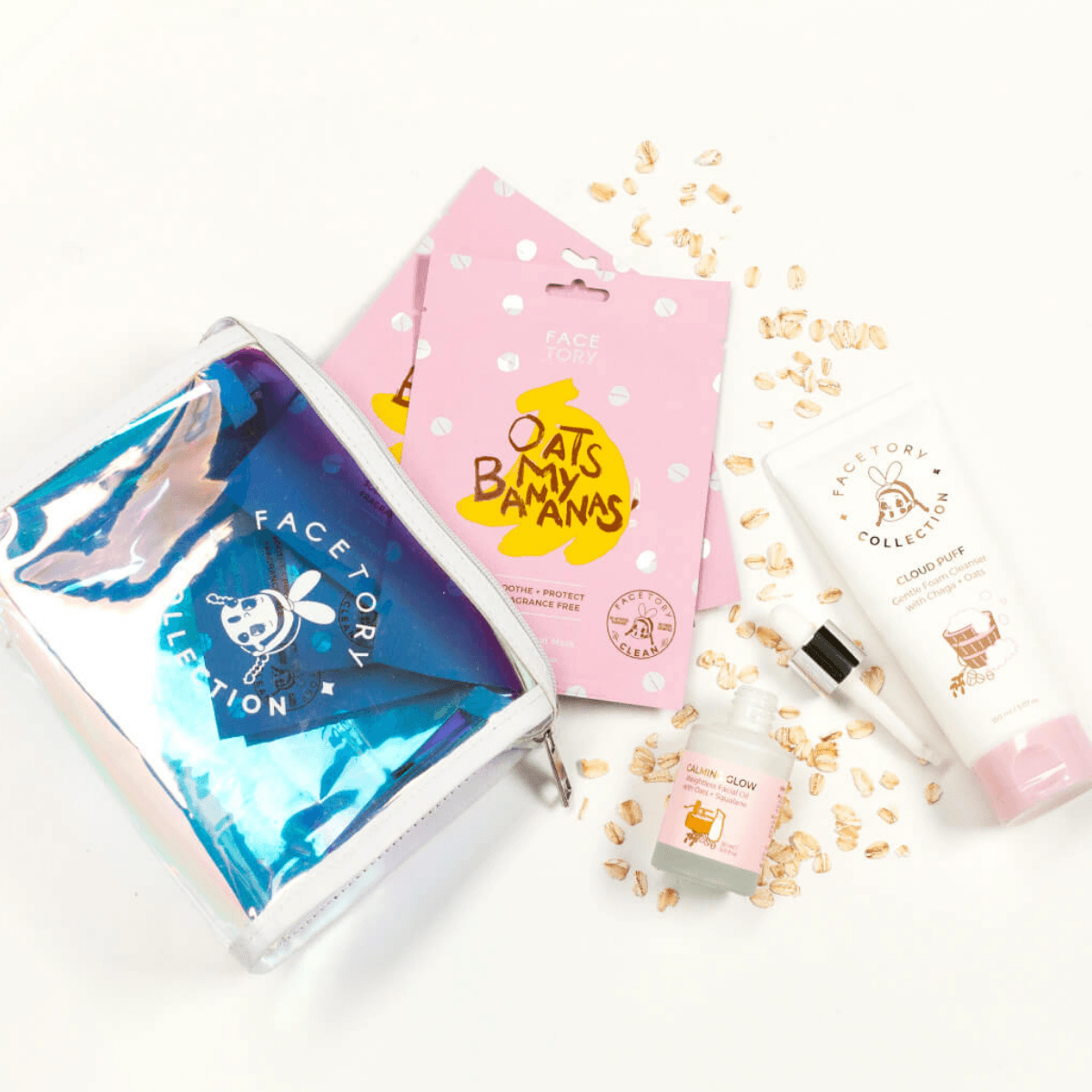 Oats So Glowy Bundle featuring facial cleanser, oil, sheet masks, and cosmetic bag for radiant skin.