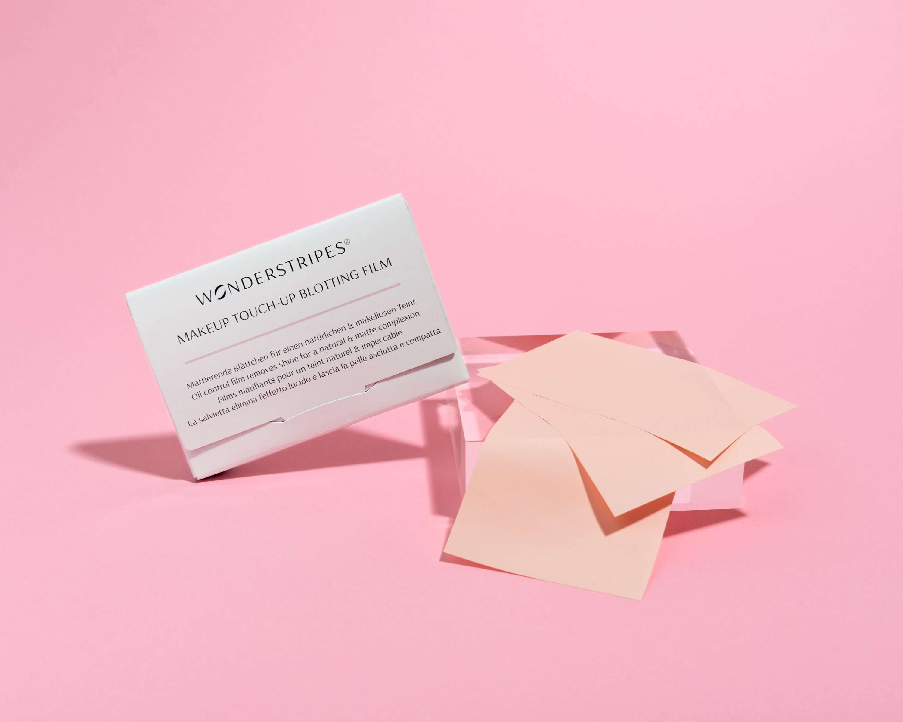 A pack of Oil Control Blotting Paper with 30 sheets, designed for absorbing excess oil and sebum from the face, featuring a compact and portable design.