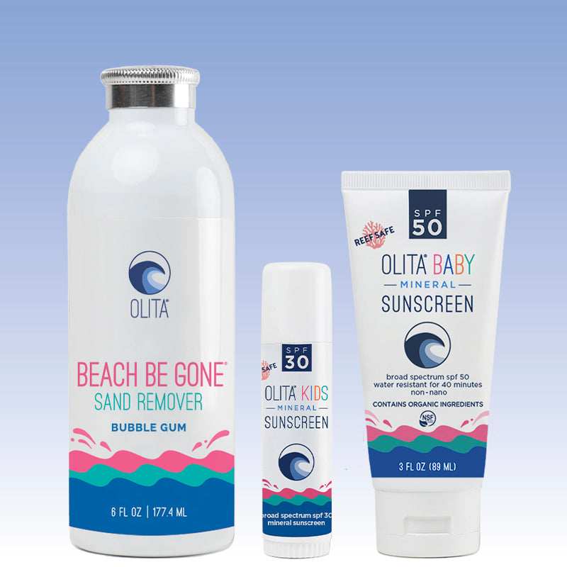 OLITA Kids Pack featuring sand removing body powder and reef-safe sunscreens for children, perfect for beach outings.