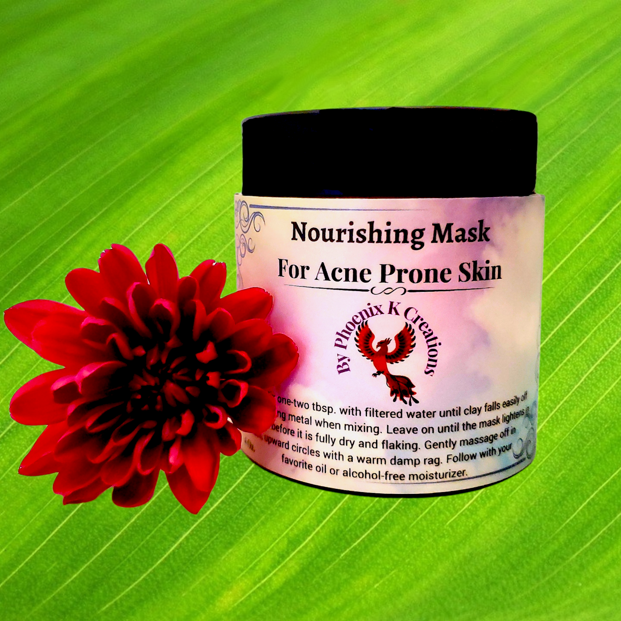 Organic Acne Prone Skin Face Mask in an amber glass jar, showcasing its natural ingredients and clay texture.