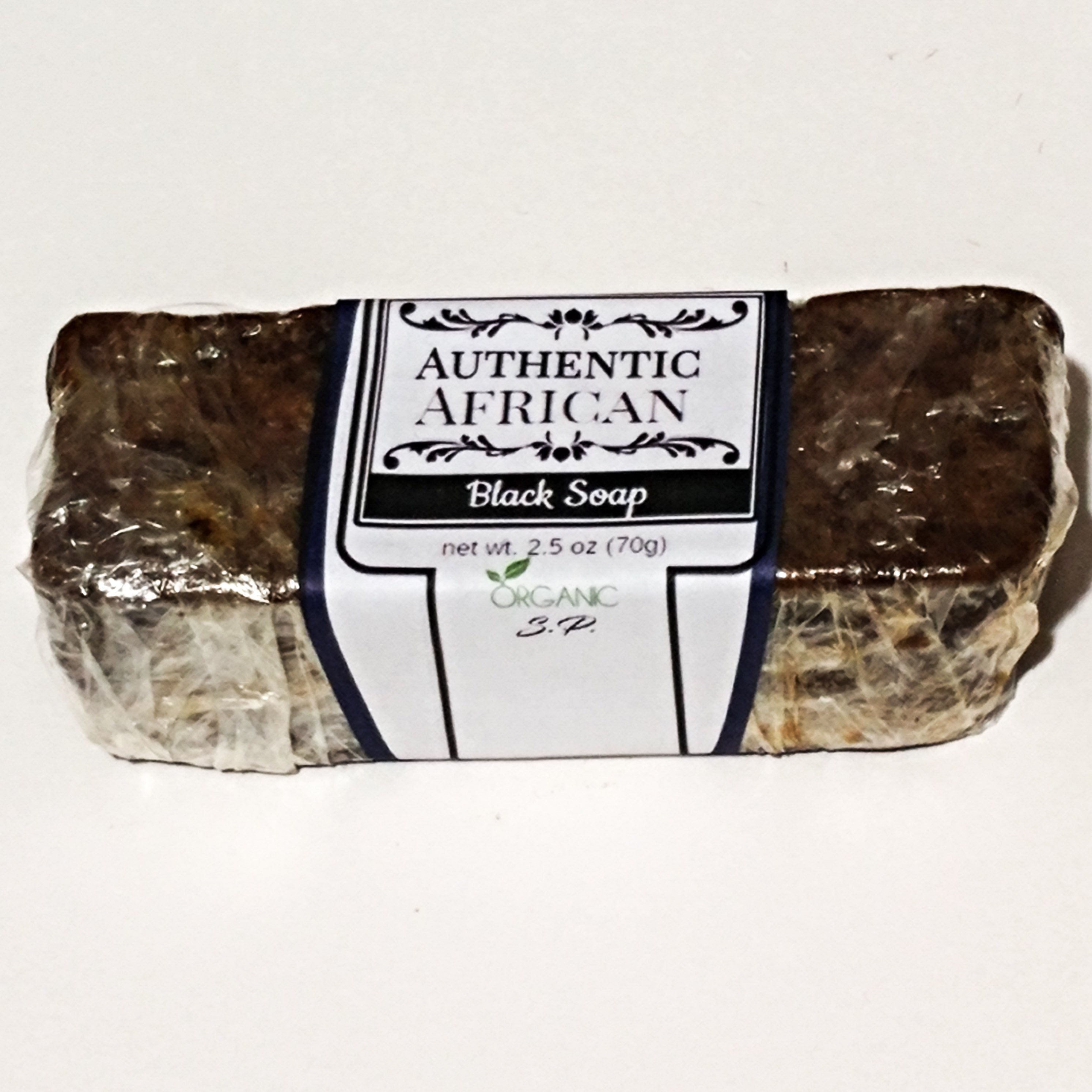 A bar of Organic African Black Soap with a rich, dark color, showcasing its natural texture and ingredients.