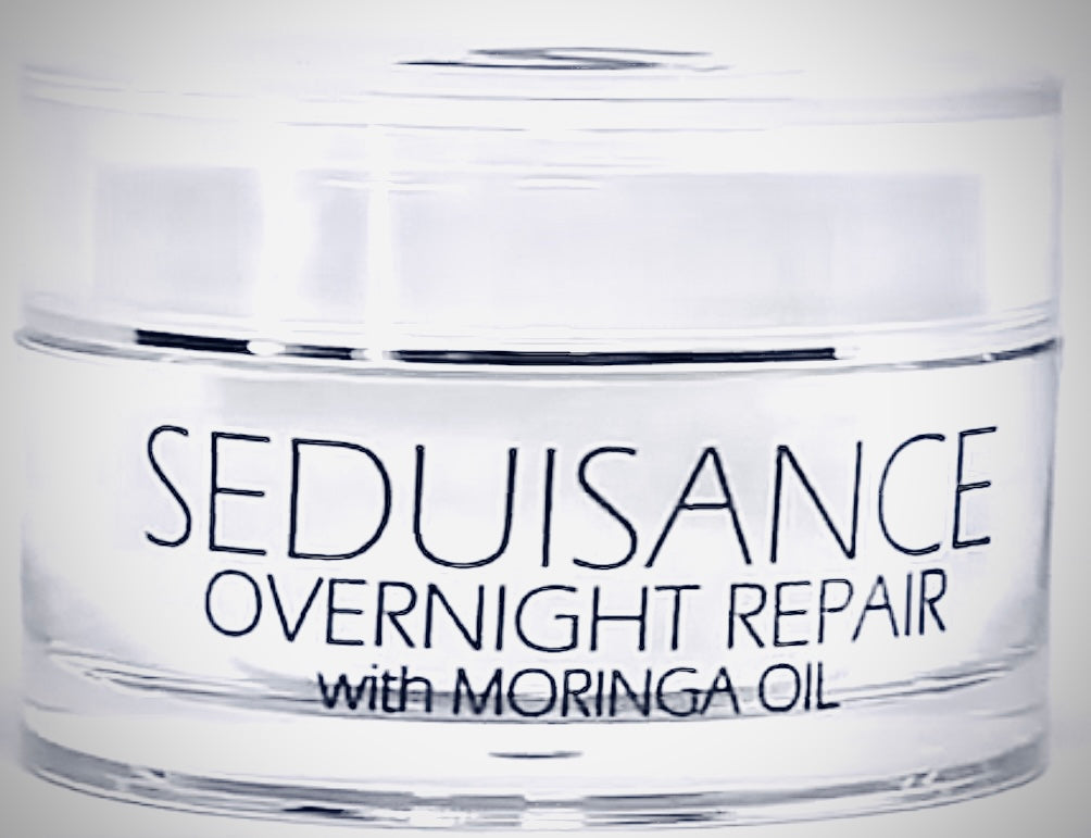 Overnight Repair Cream with Moringa Oil in a sleek jar, showcasing its rich texture and natural ingredients.