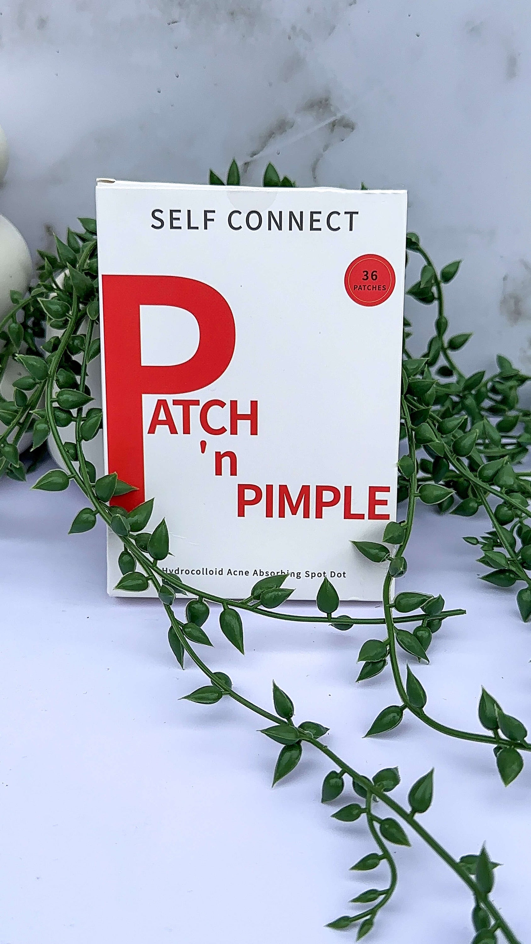 Pack Patch 'n Pimple box containing 36 hydrocolloid patches in red packaging, designed for acne treatment.