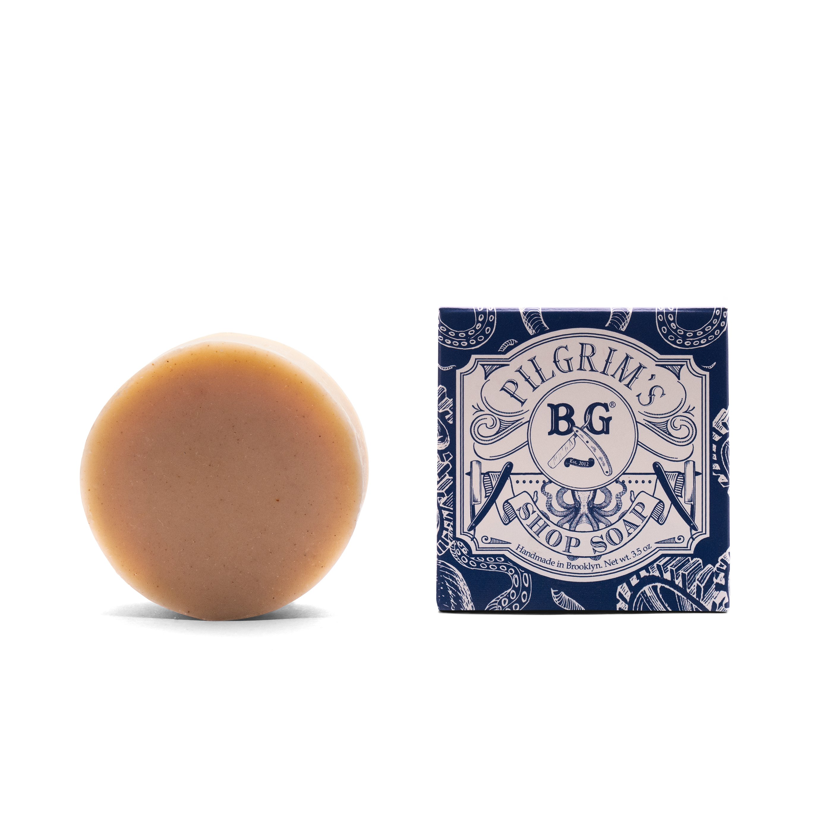 Pilgrim's Shop Soap bar with earthy tones, showcasing its natural ingredients and handcrafted quality.