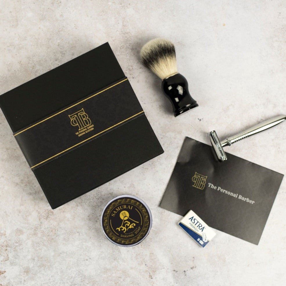 Premium Shaving Gift Set featuring a DE safety razor, shaving brush, shaving soap, and razor blades in a black gift box.