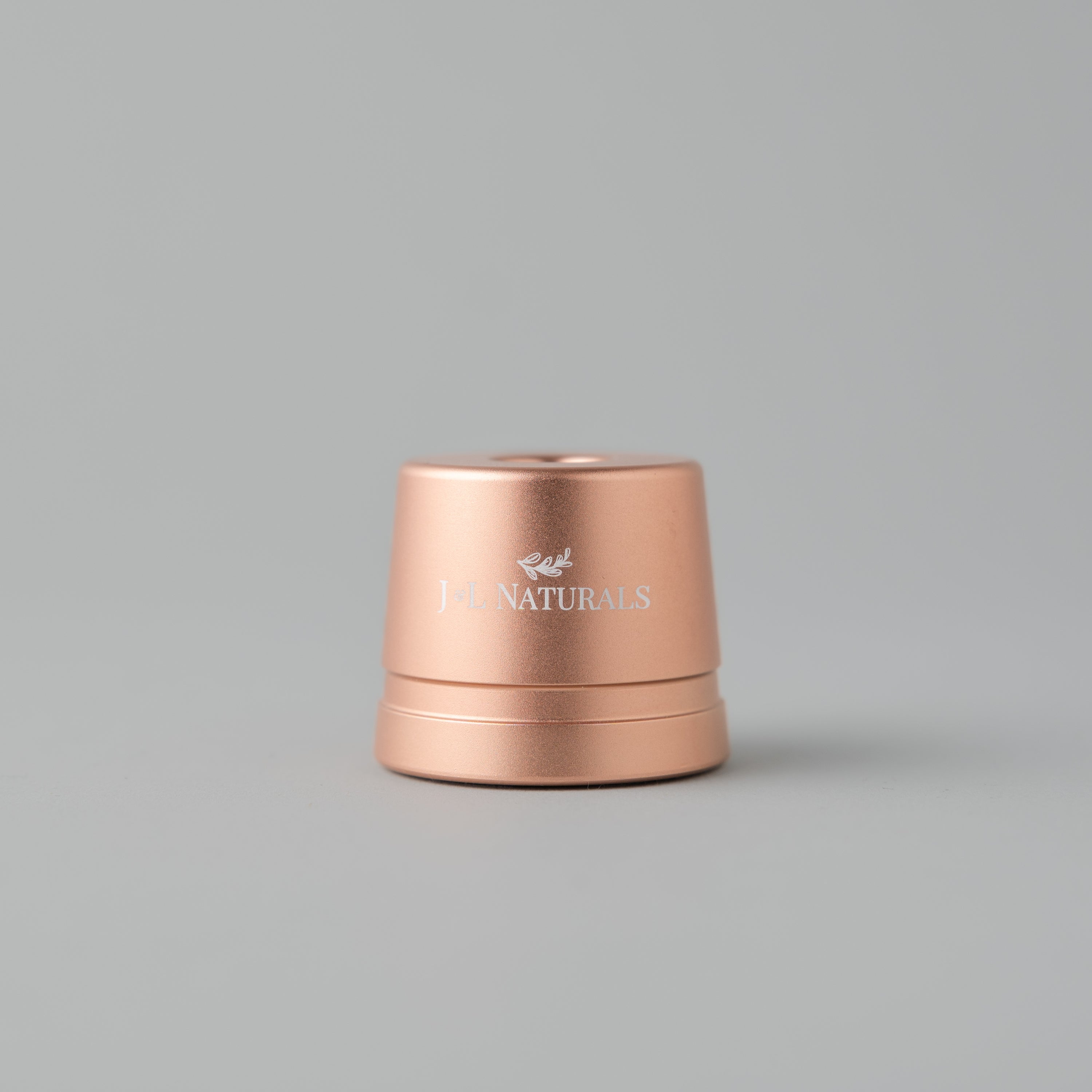 Stylish Razor Stand in Black, Rose Gold, Green, and White, designed to hold reusable razors securely and prevent water damage.