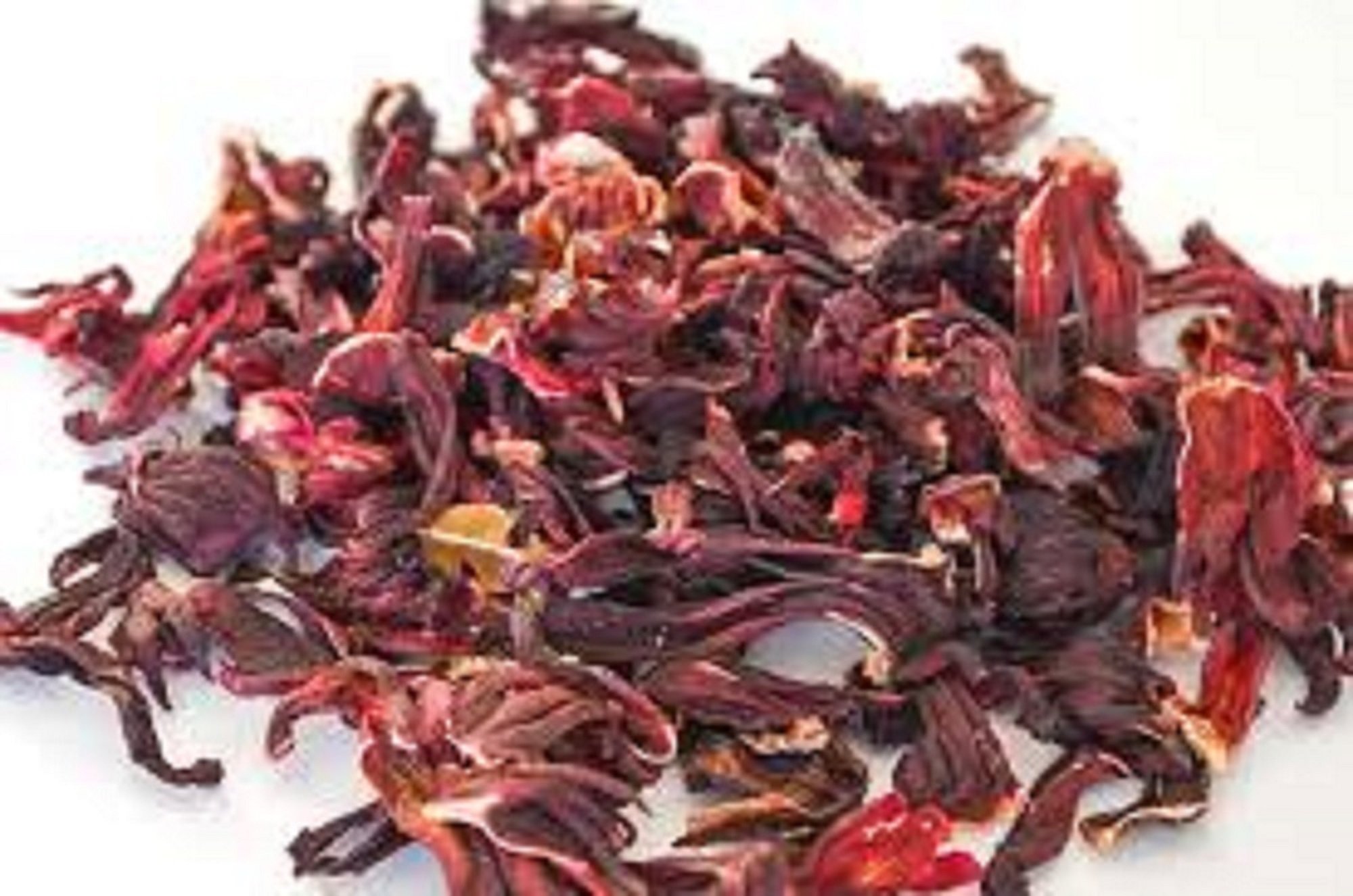 A vibrant red powder mix of hibiscus and ginger, showcasing its rich color and texture, perfect for making natural tea.