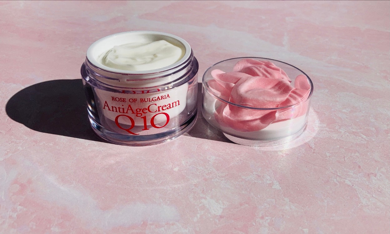 A jar of Biofresh Rejuvenating Face Cream with Rose Water and Q10, showcasing its elegant packaging and rich texture.