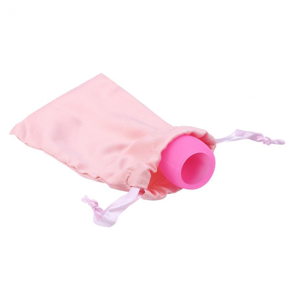 Release Valve Menstrual Cup in a pink carry pouch, showcasing its innovative design and medical-grade silicone material.