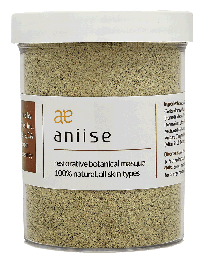 Restorative Botanical Face Mask in a jar with natural herbs and flowers surrounding it, showcasing its organic ingredients.