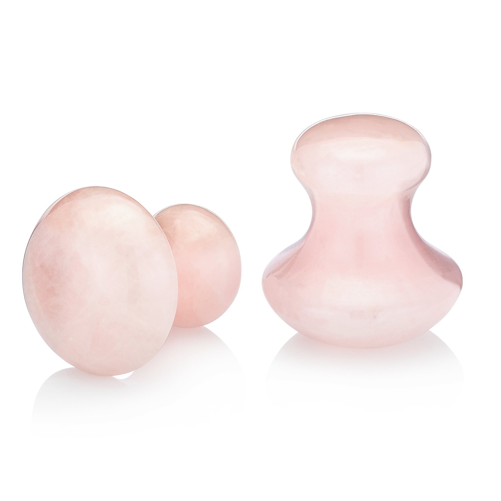 Hand-carved rose quartz facial tool designed for facial massage and skincare, showcasing its smooth surface and elegant pink hue.