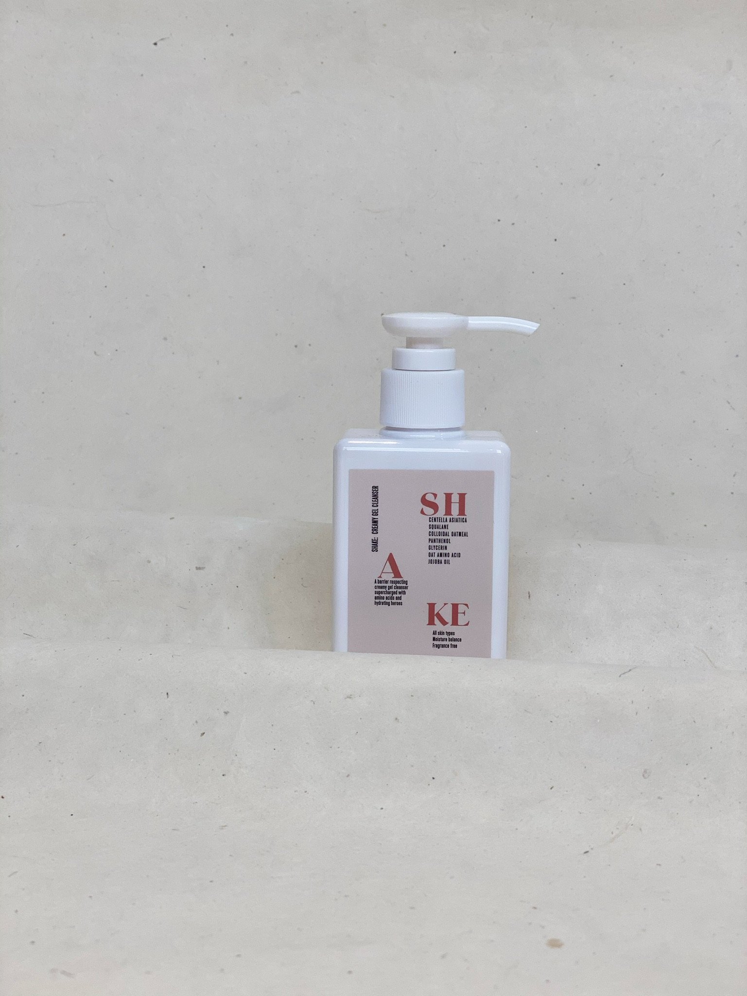 SHAKE: Creamy Gel Cleanser in a sleek 150 ML bottle, showcasing its creamy texture and hydrating ingredients.