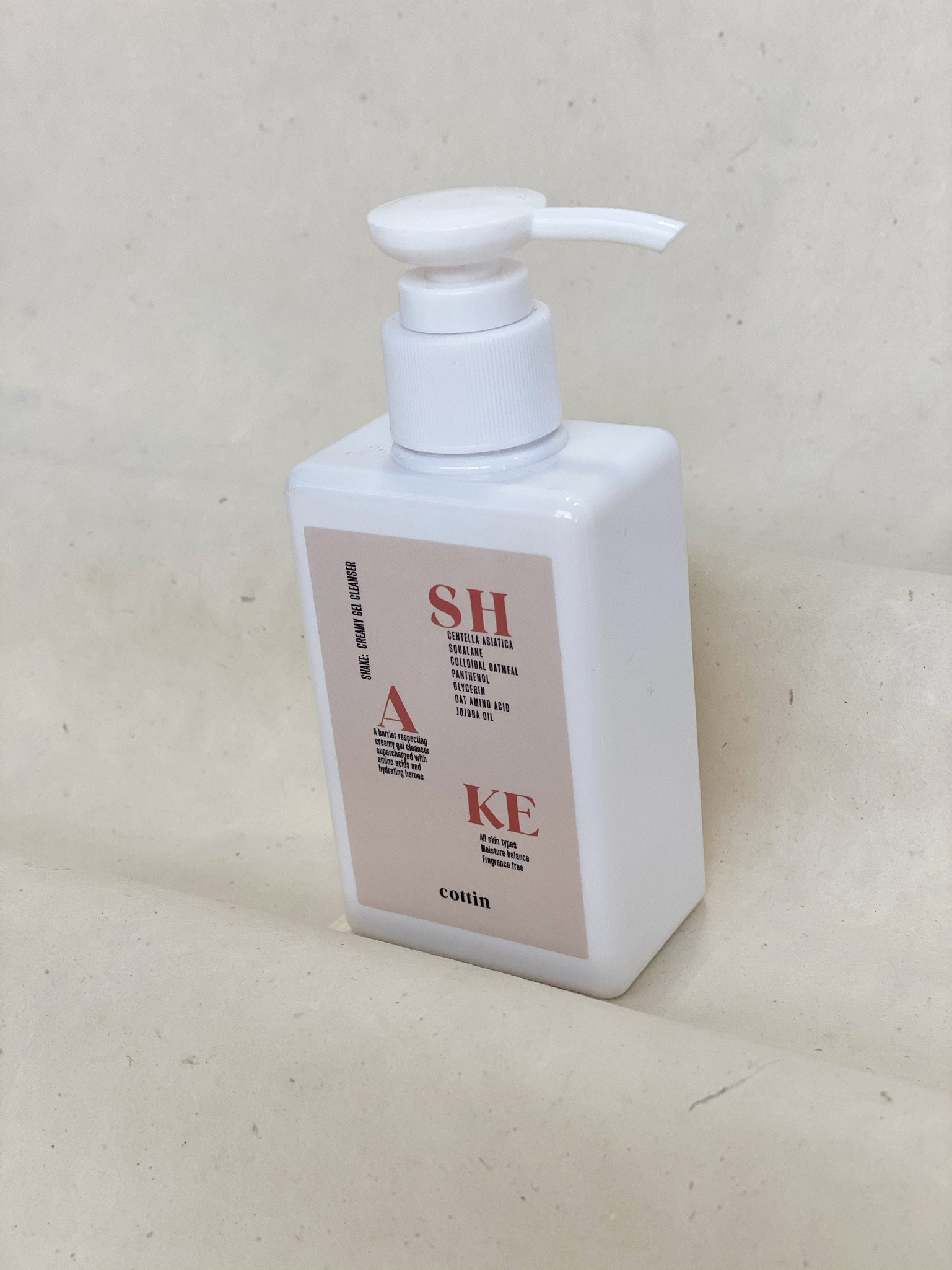 SHAKE: Creamy Gel Cleanser in a sleek 150 ML bottle, showcasing its creamy texture and hydrating ingredients.