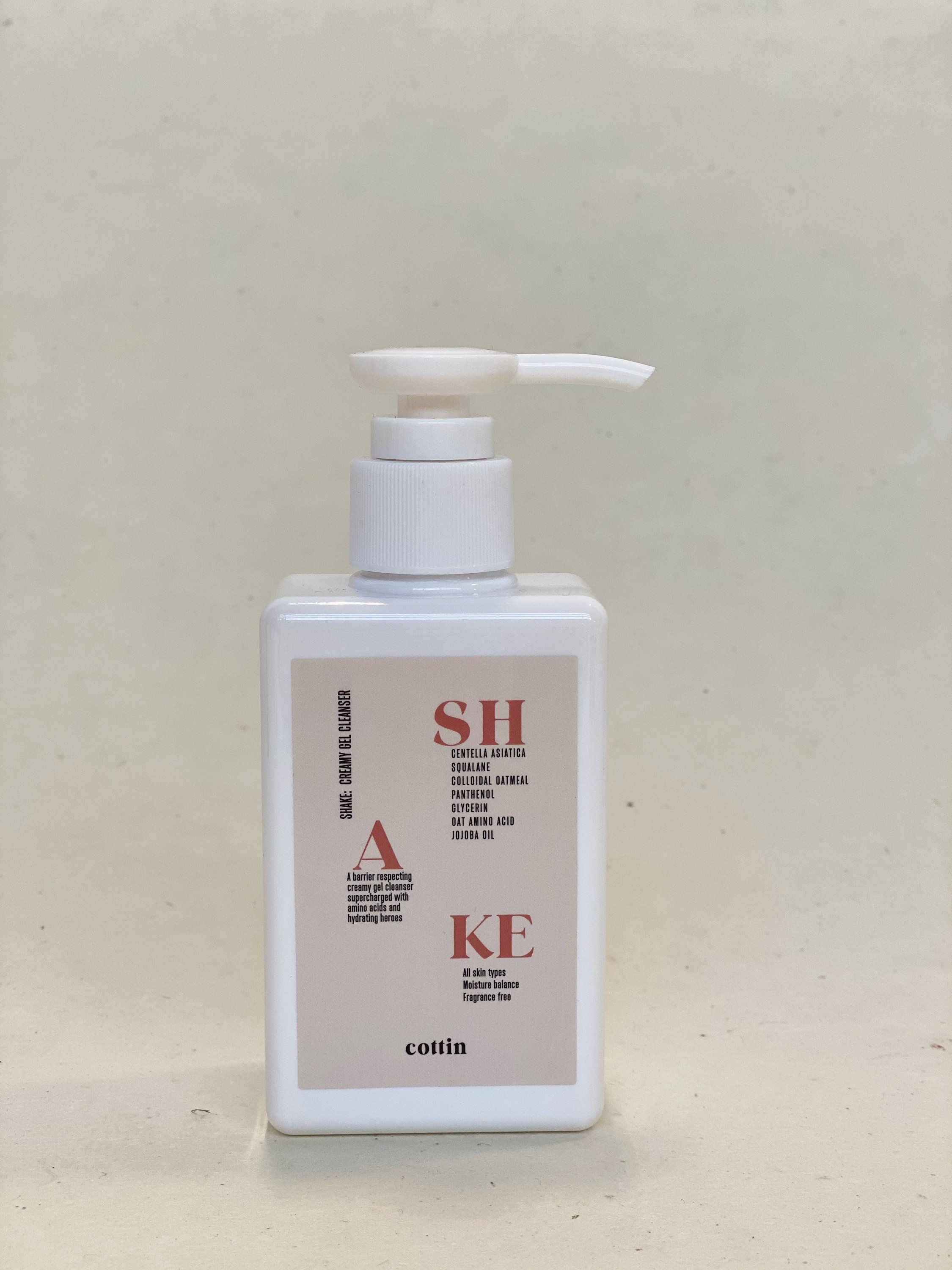 SHAKE: Creamy Gel Cleanser in a sleek 150 ML bottle, showcasing its creamy texture and hydrating ingredients.