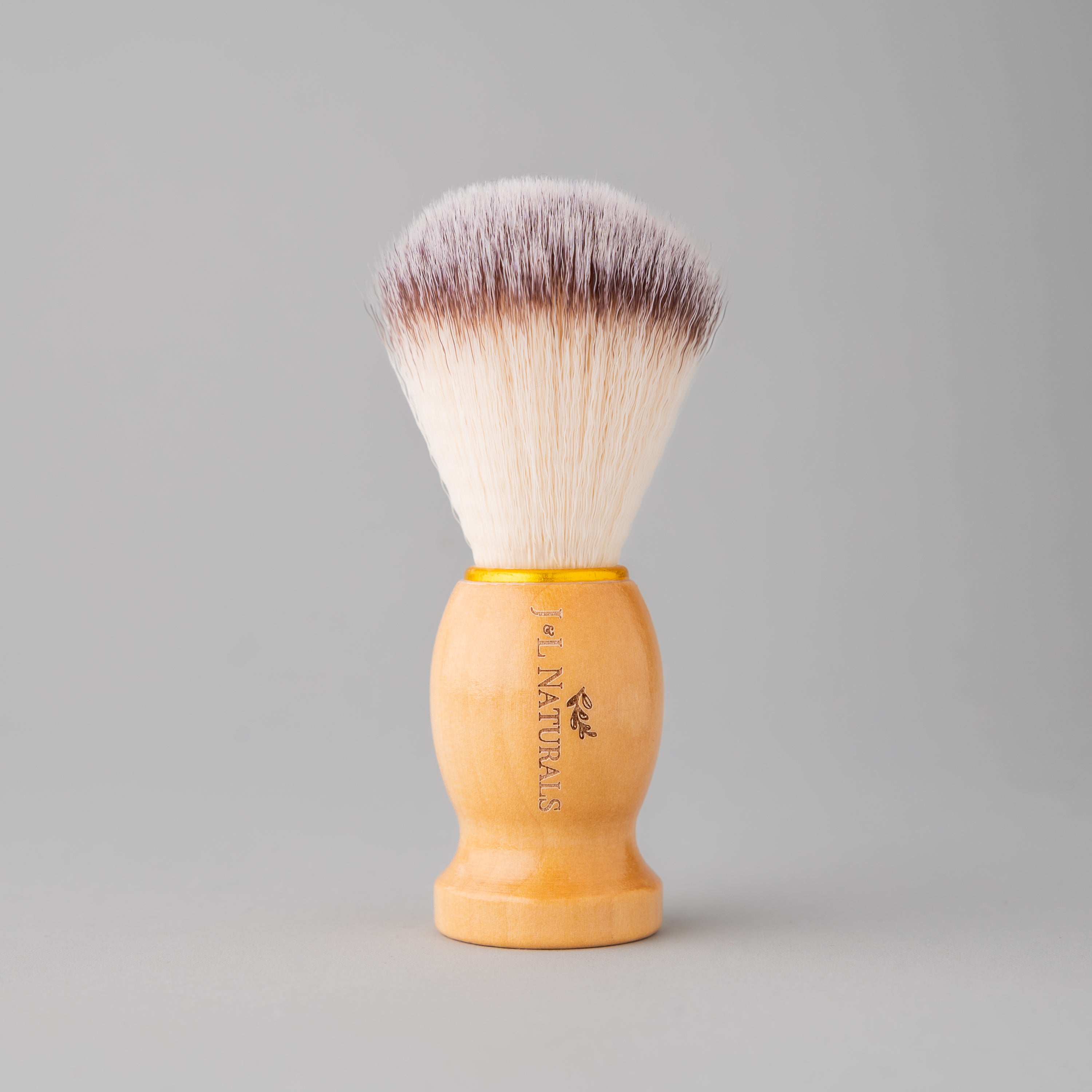 A high-quality Shave Brush with soft bristles, designed for creating lather and enhancing shaving experience.