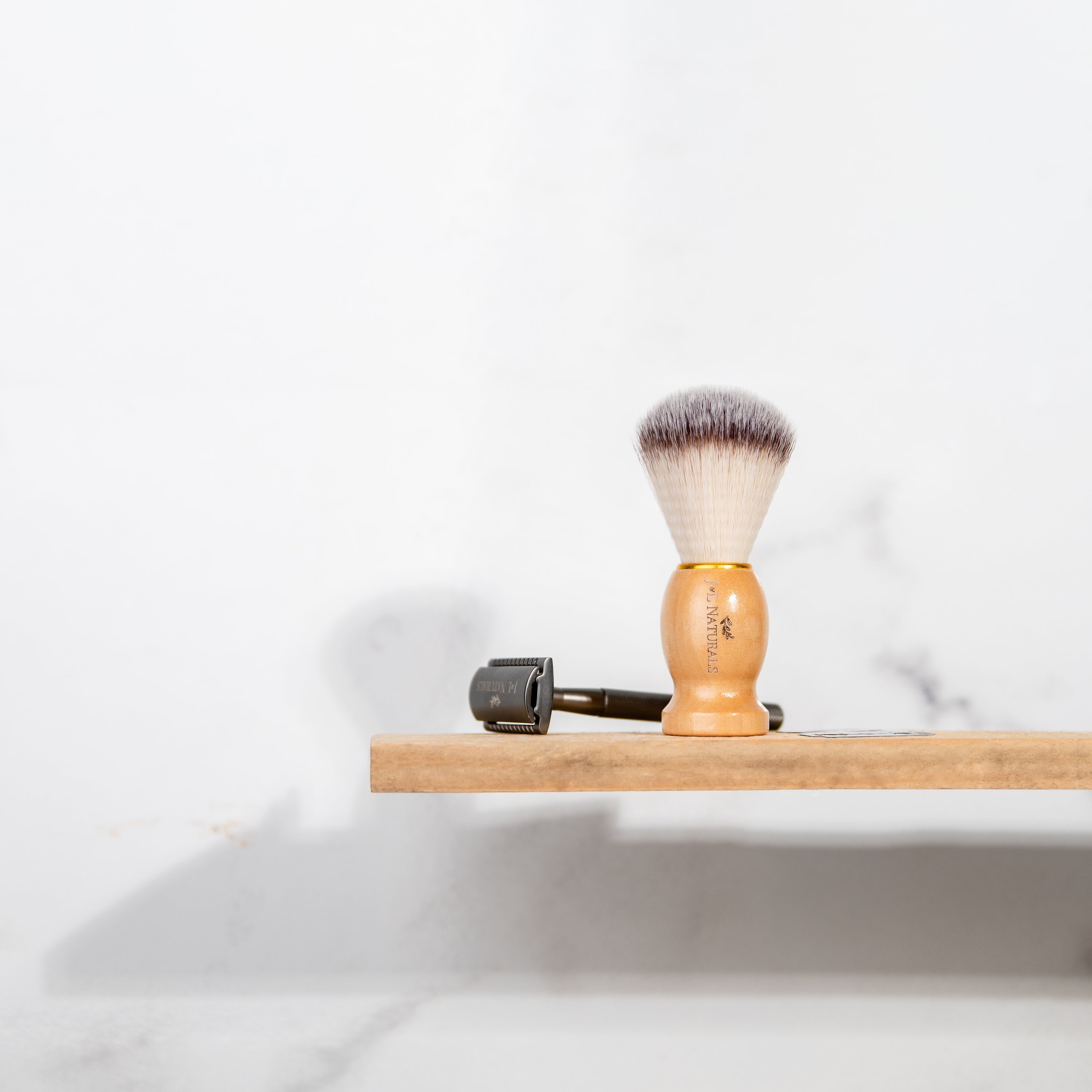 A high-quality Shave Brush with soft bristles, designed for creating lather and enhancing shaving experience.