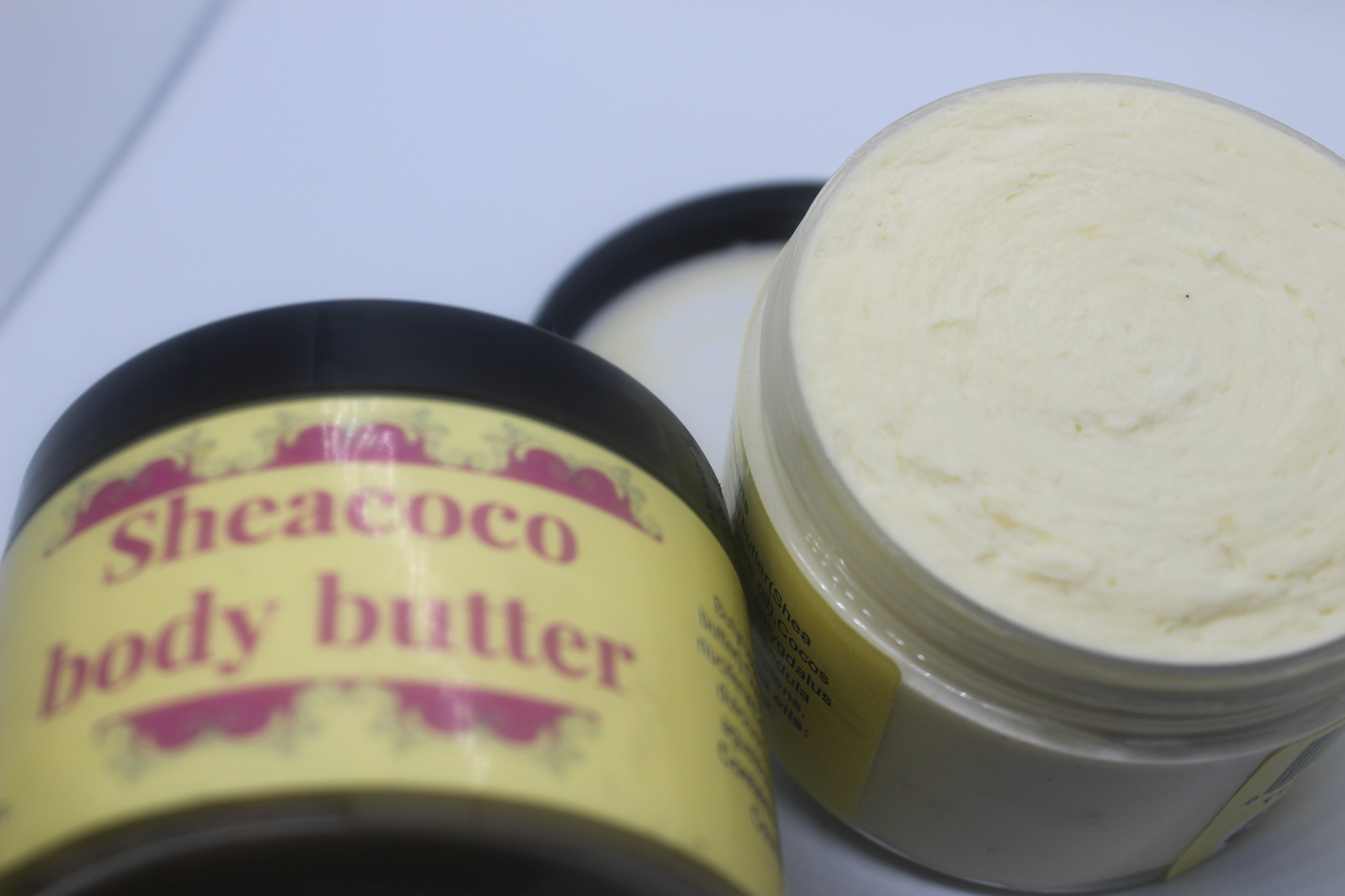 Sheacoco body butter in a PET container, showcasing its rich texture and natural ingredients.