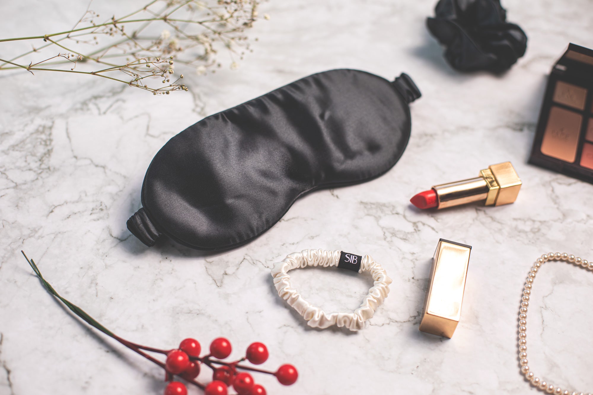 SIB™ mulberry silk eye mask in luxurious silk with matching pouch, designed for comfort and hydration.