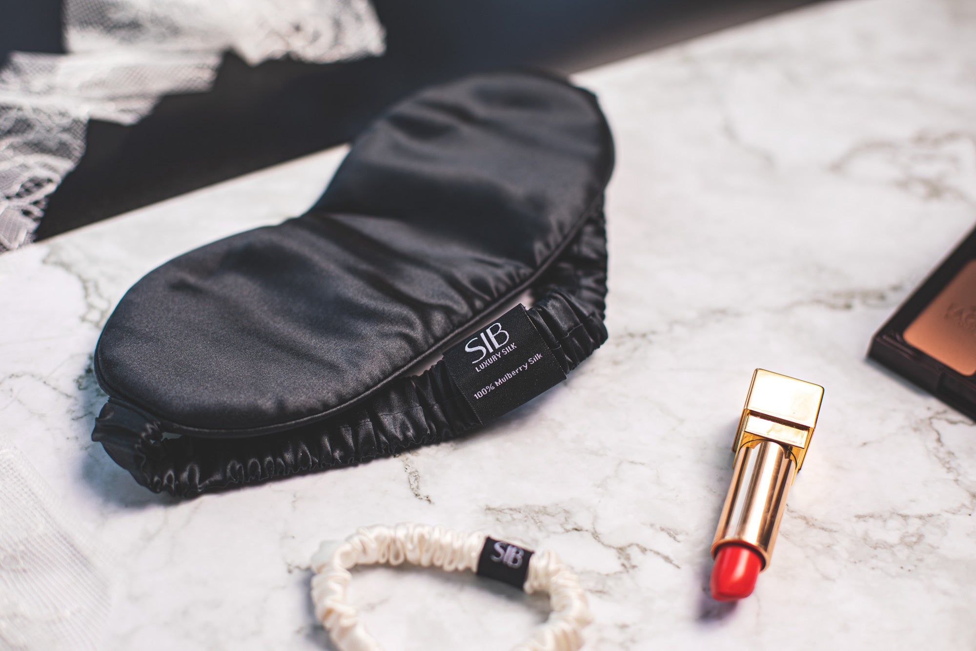 SIB™ mulberry silk eye mask in luxurious silk with matching pouch, designed for comfort and hydration.