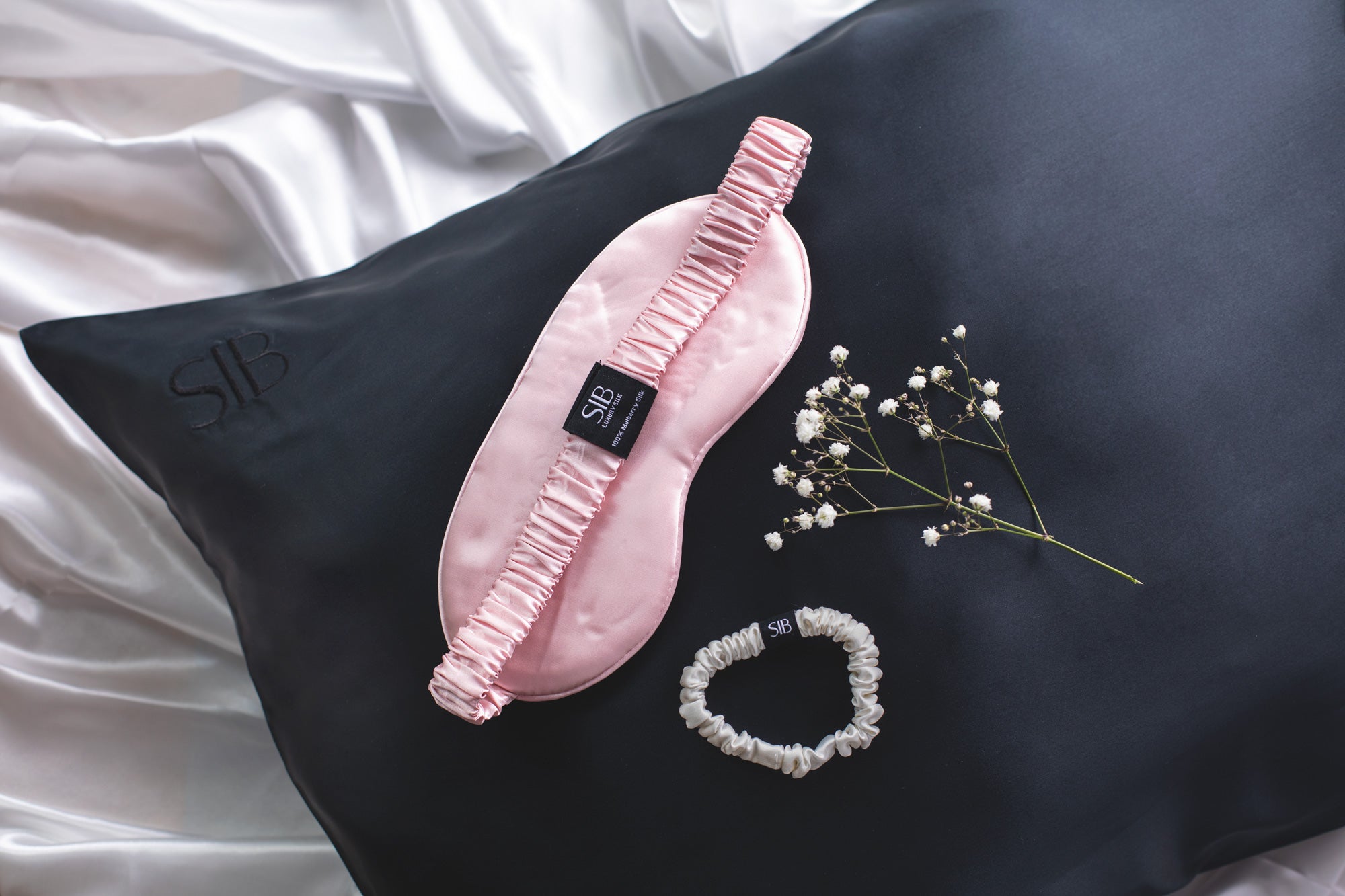 SIB™ mulberry silk eye mask in luxurious silk with matching pouch, designed for comfort and hydration.