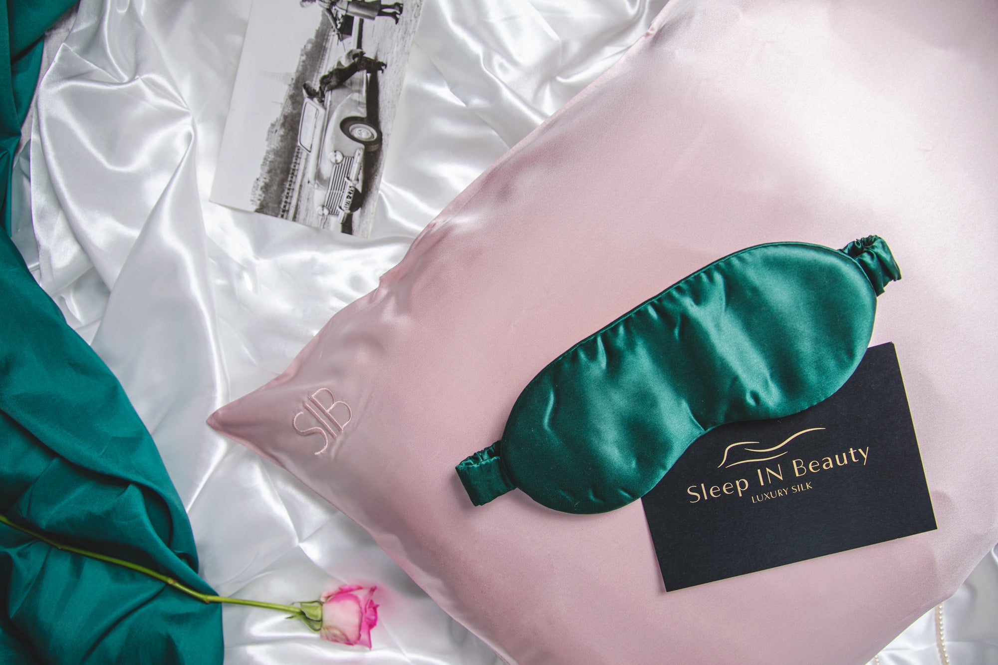 SIB™ Silk Pillowcase in luxurious black silk with hidden zipper, elegantly presented in a gold gift box.