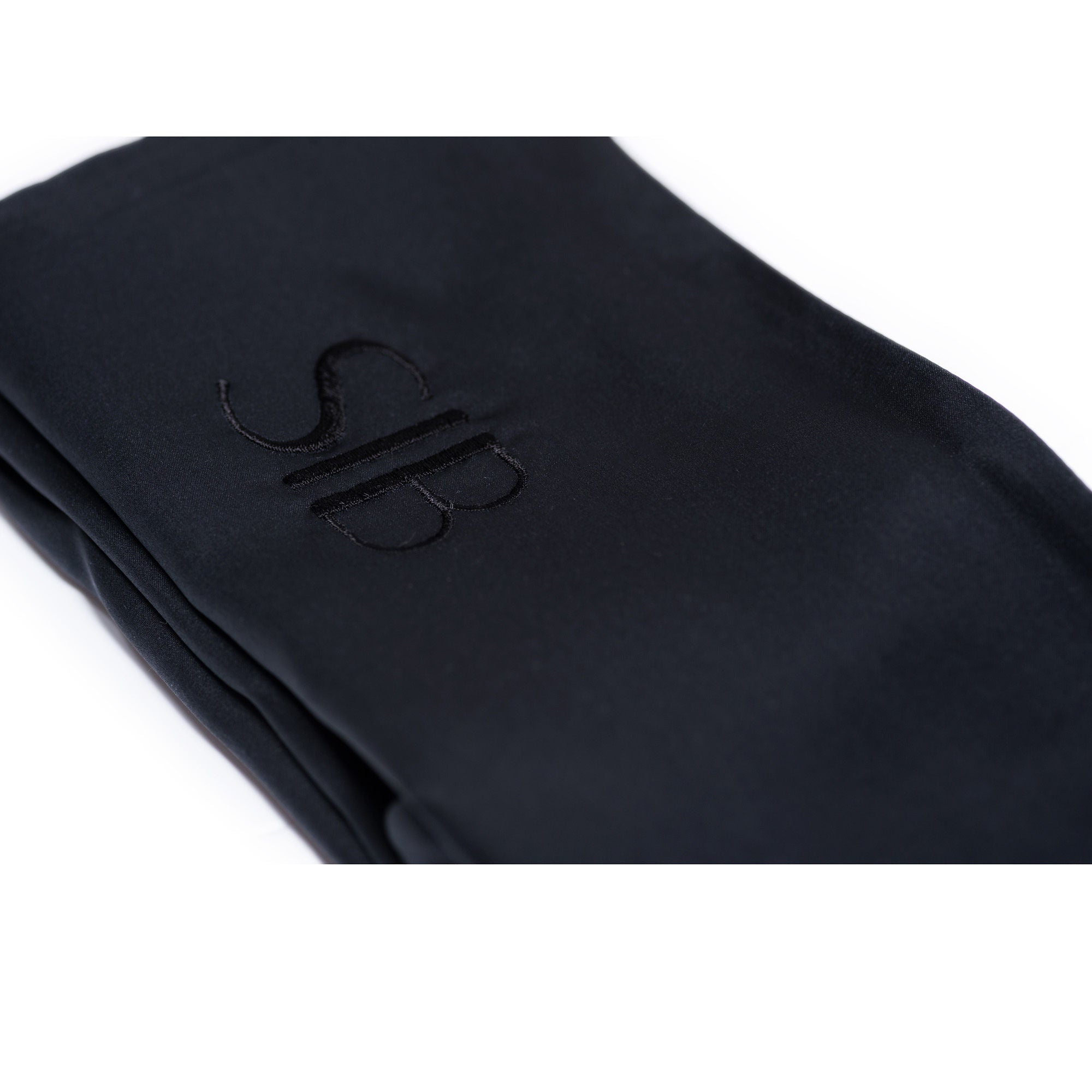 SIB™ Silk Pillowcase in luxurious black silk with hidden zipper, elegantly presented in a gold gift box.