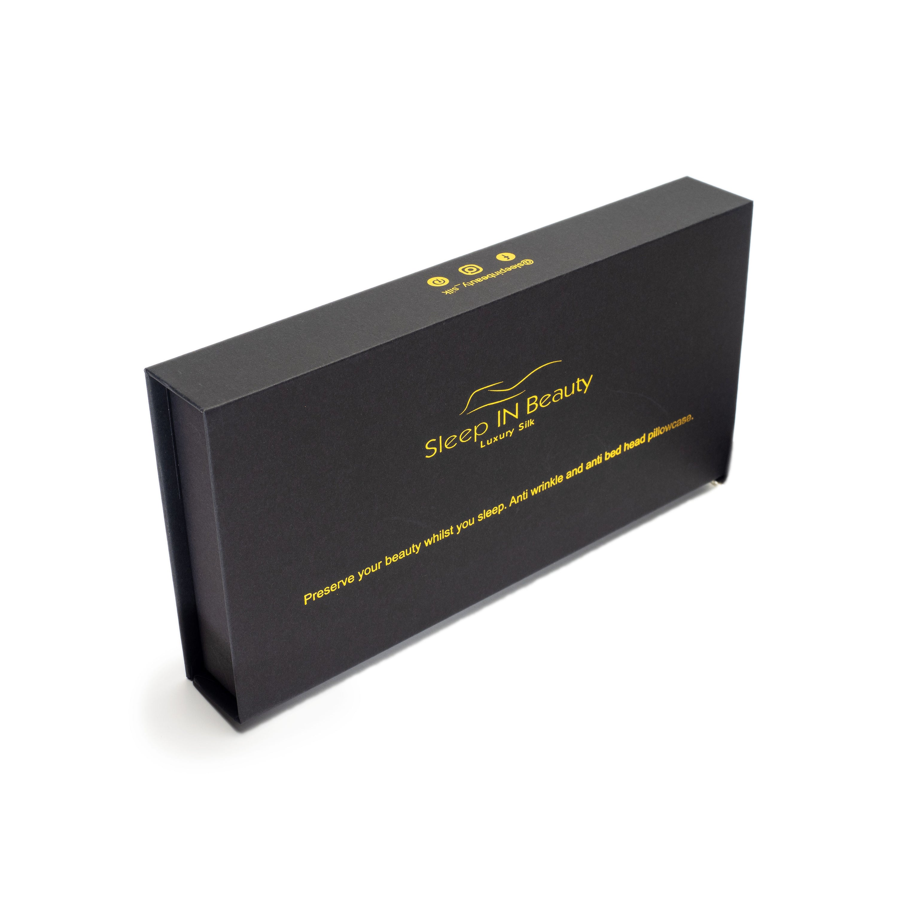 SIB™ Silk Pillowcase in luxurious black silk with hidden zipper, elegantly presented in a gold gift box.